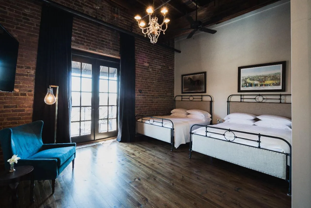 Bed in GunRunner Boutique Hotel