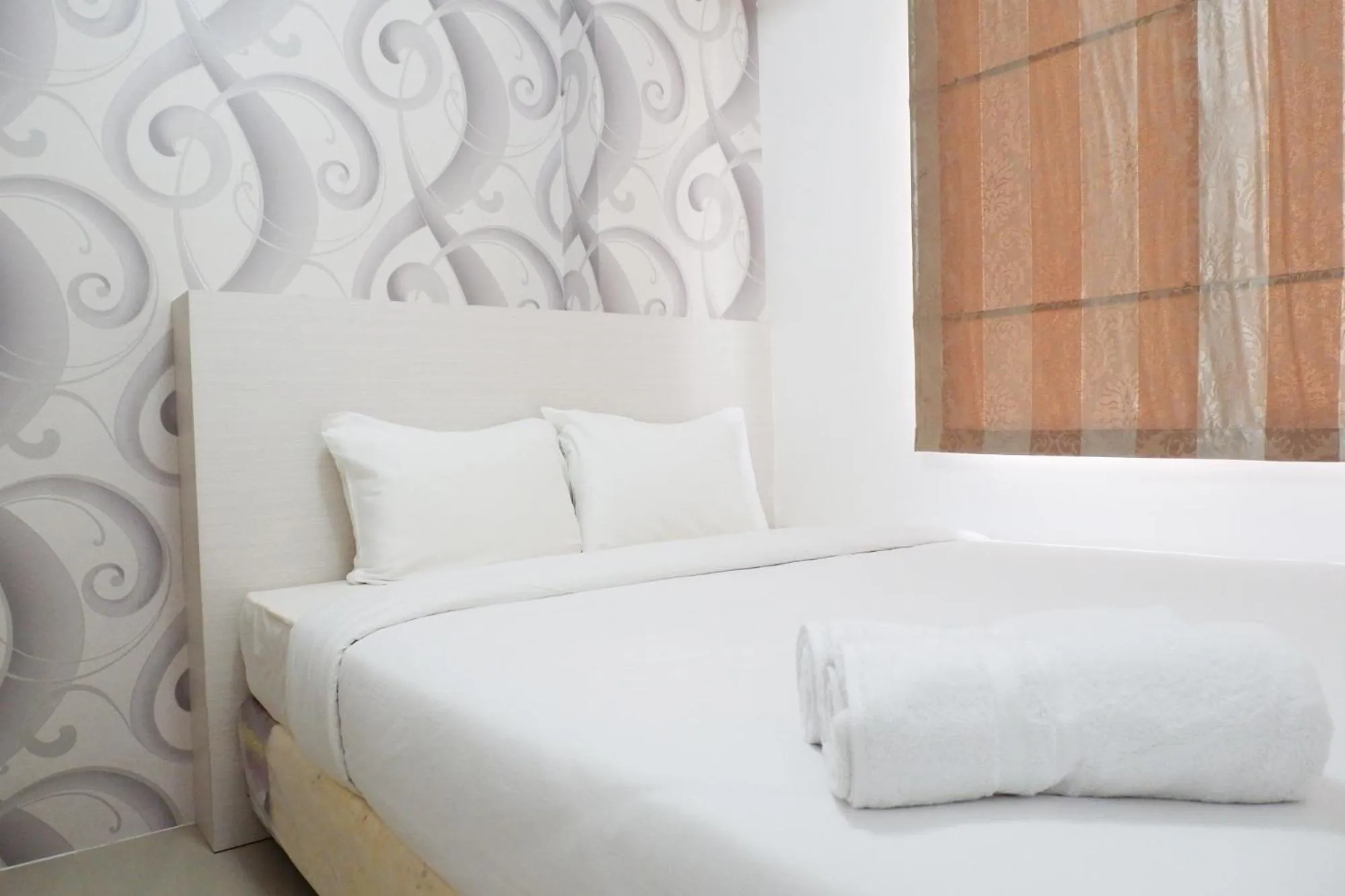 Bed in Exquisite 2BR Bassura City Apartment near Shopping Mall By Travelio