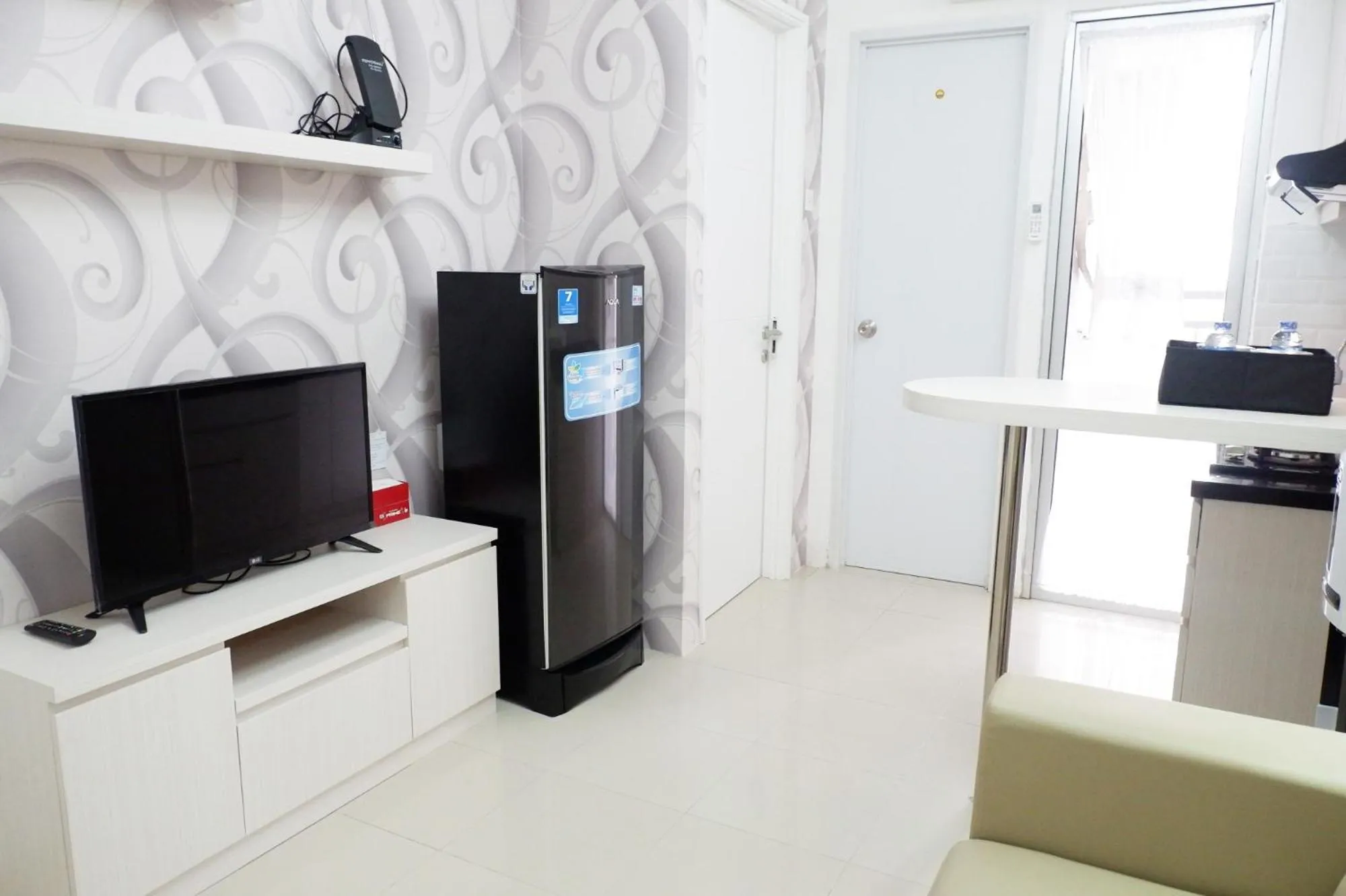 TV and multimedia in Exquisite 2BR Bassura City Apartment near Shopping Mall By Travelio