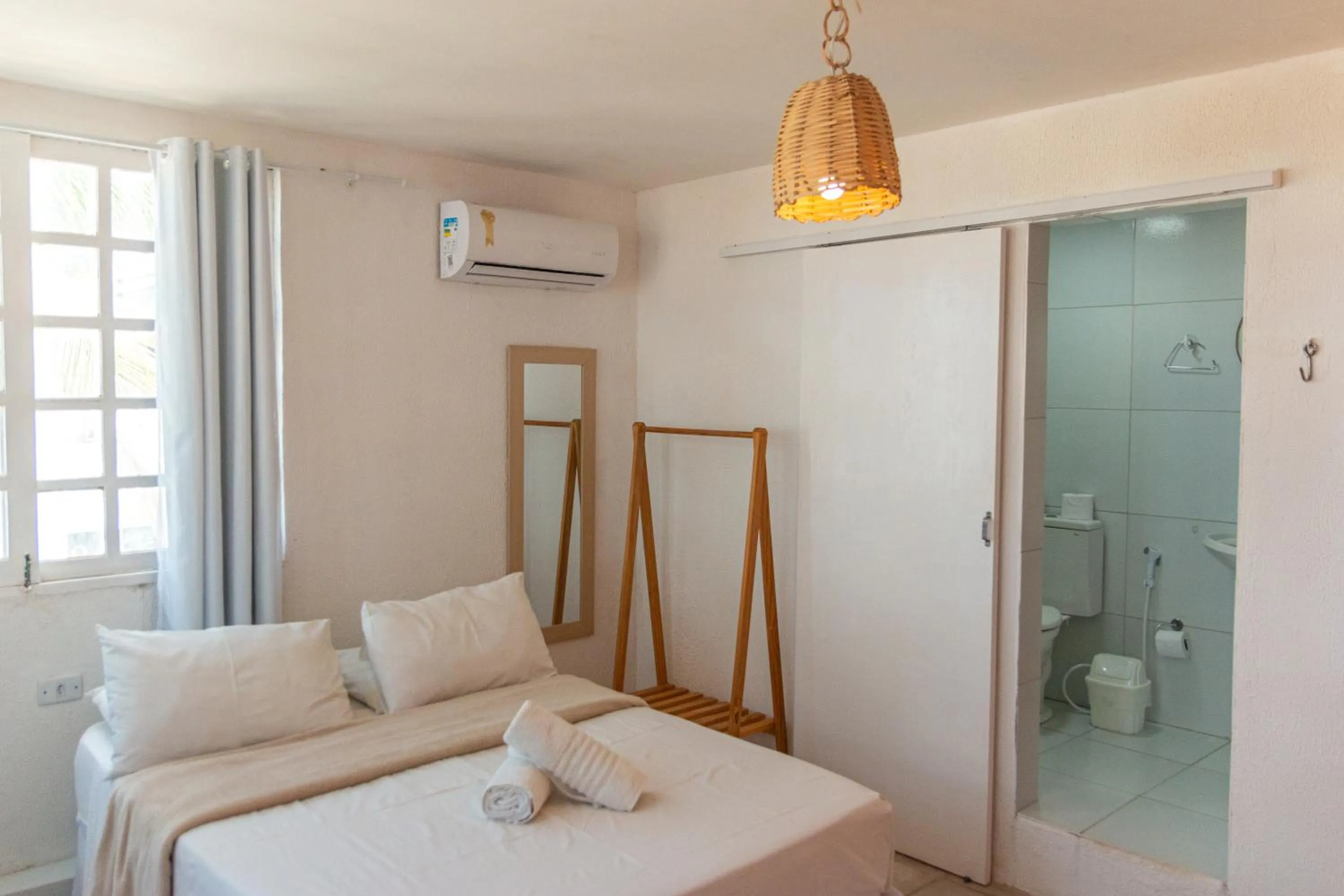 Triple Room with Sea View in Pousada La Bella Luna
