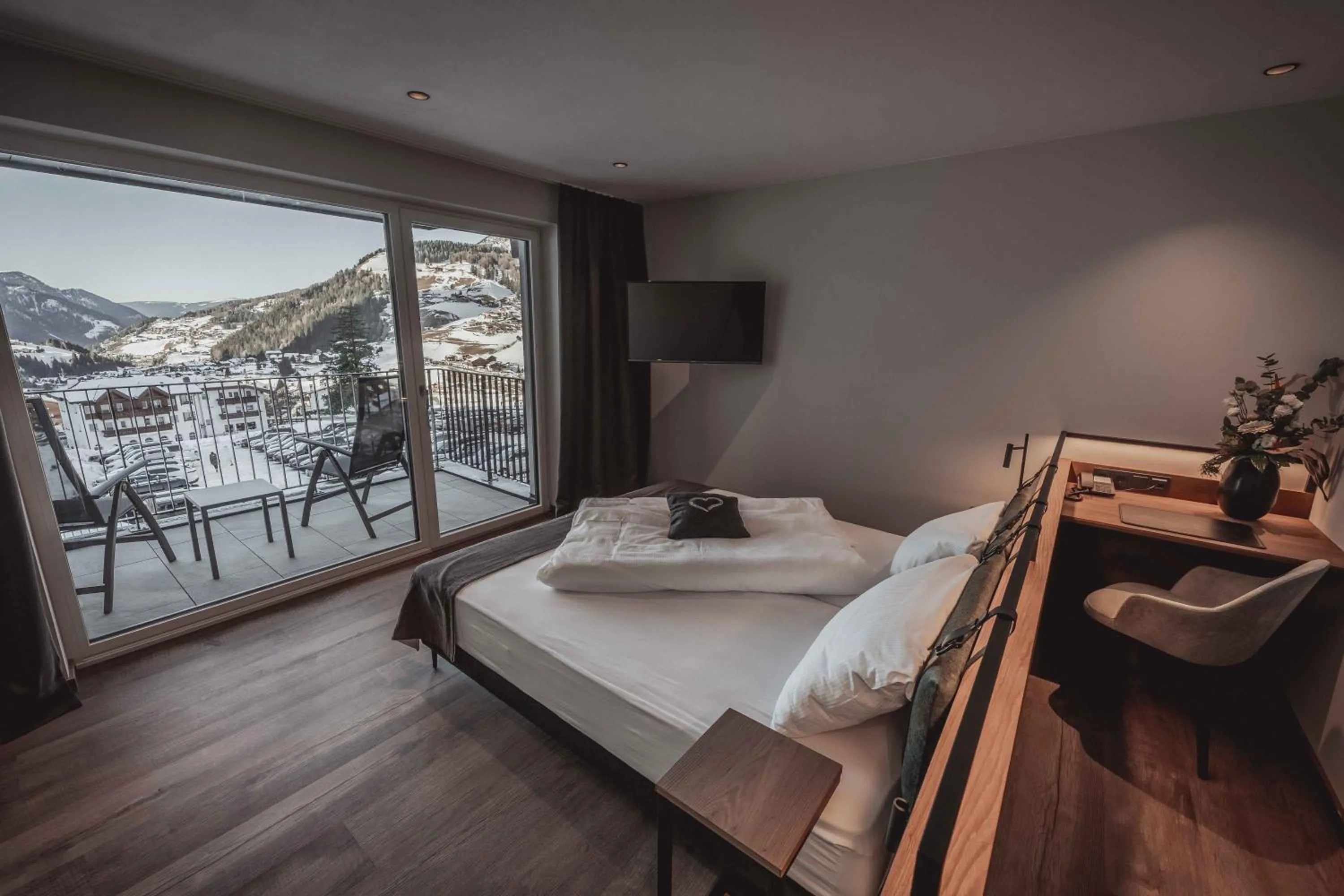 Bed in Hotel Continental Dolomites