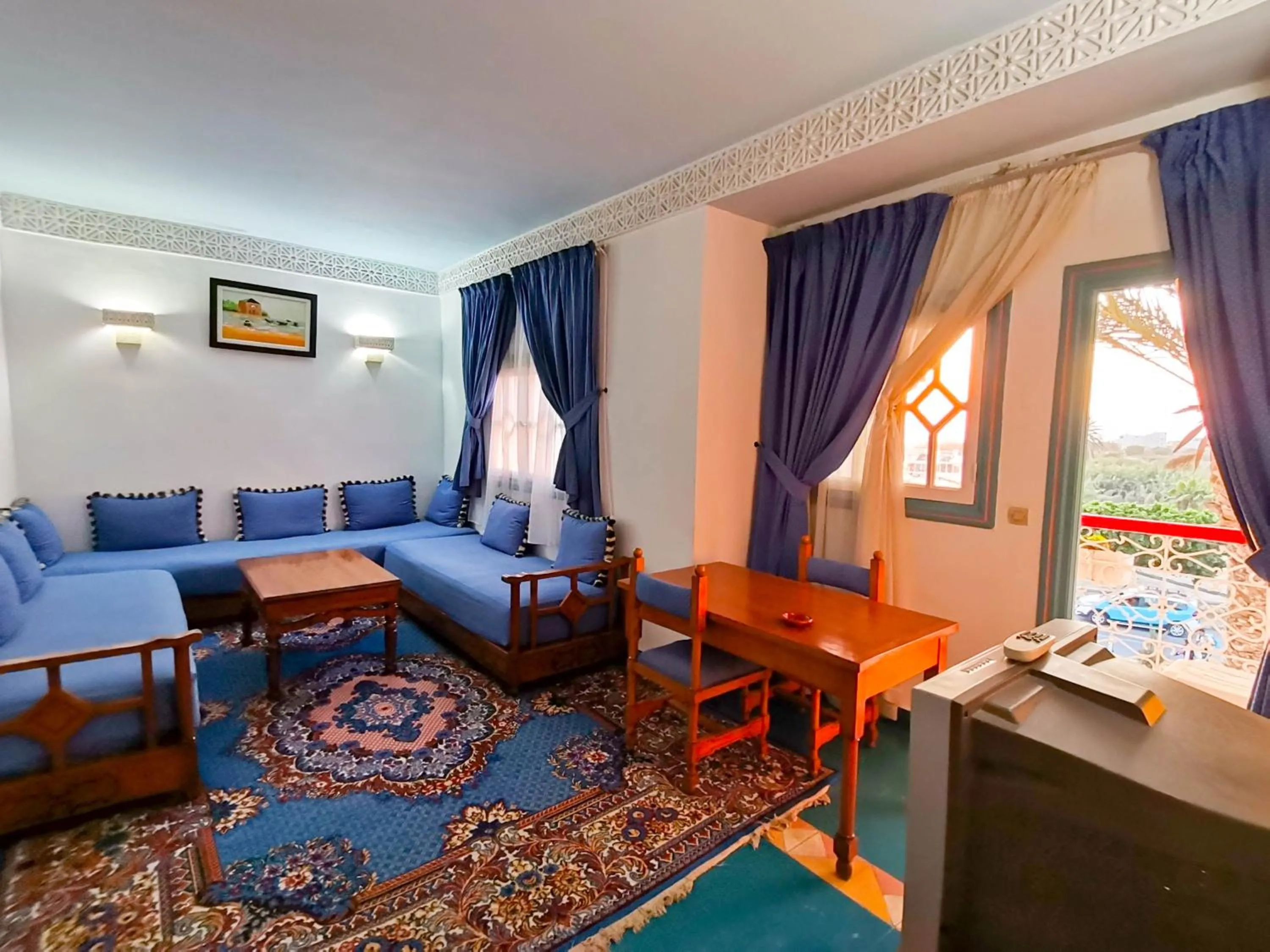 Bedroom in Hôtel Auberge du Littoral