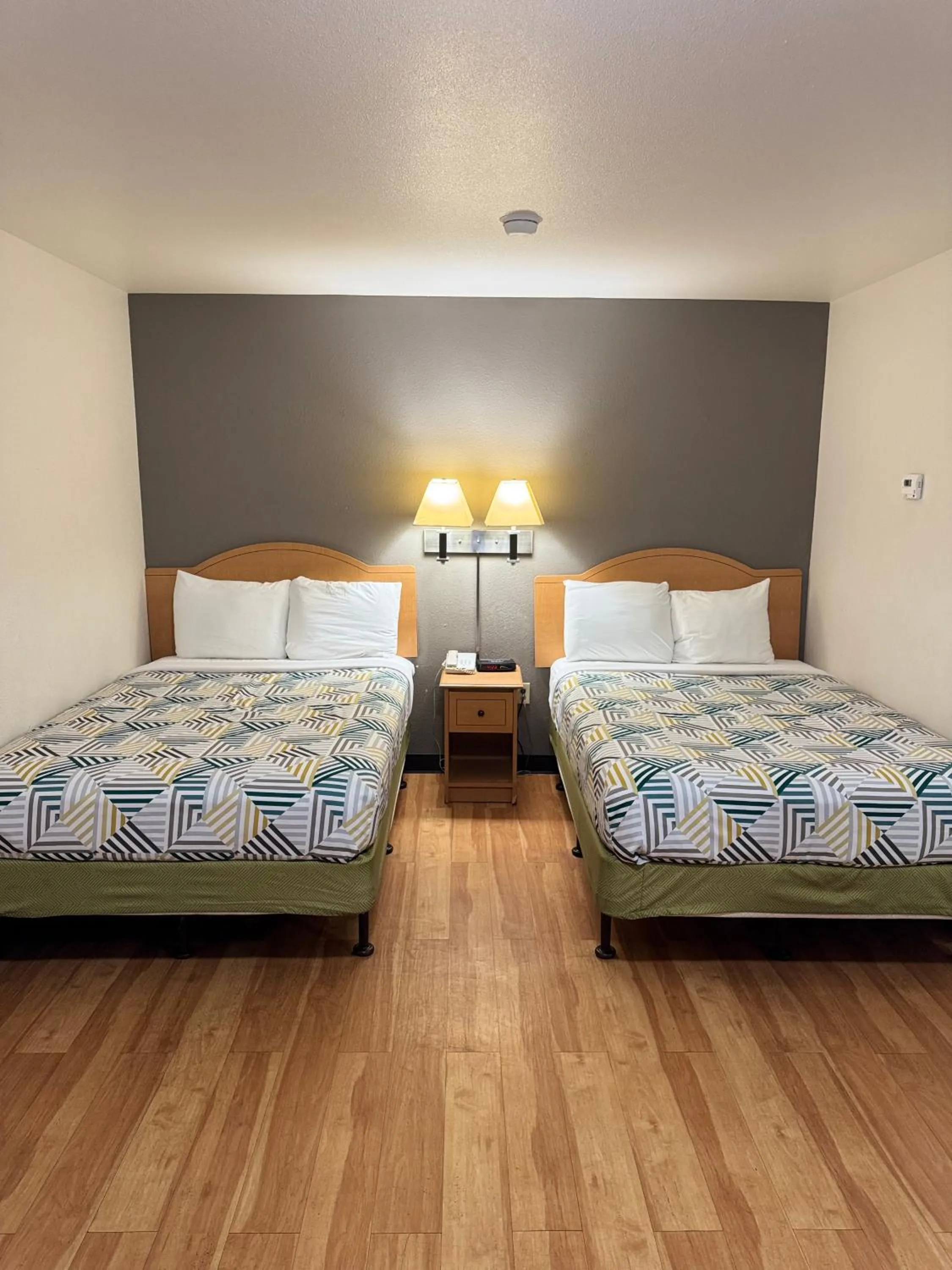 Bed in Blue Bonnet Suites -Lubbock, TX - Medical Center