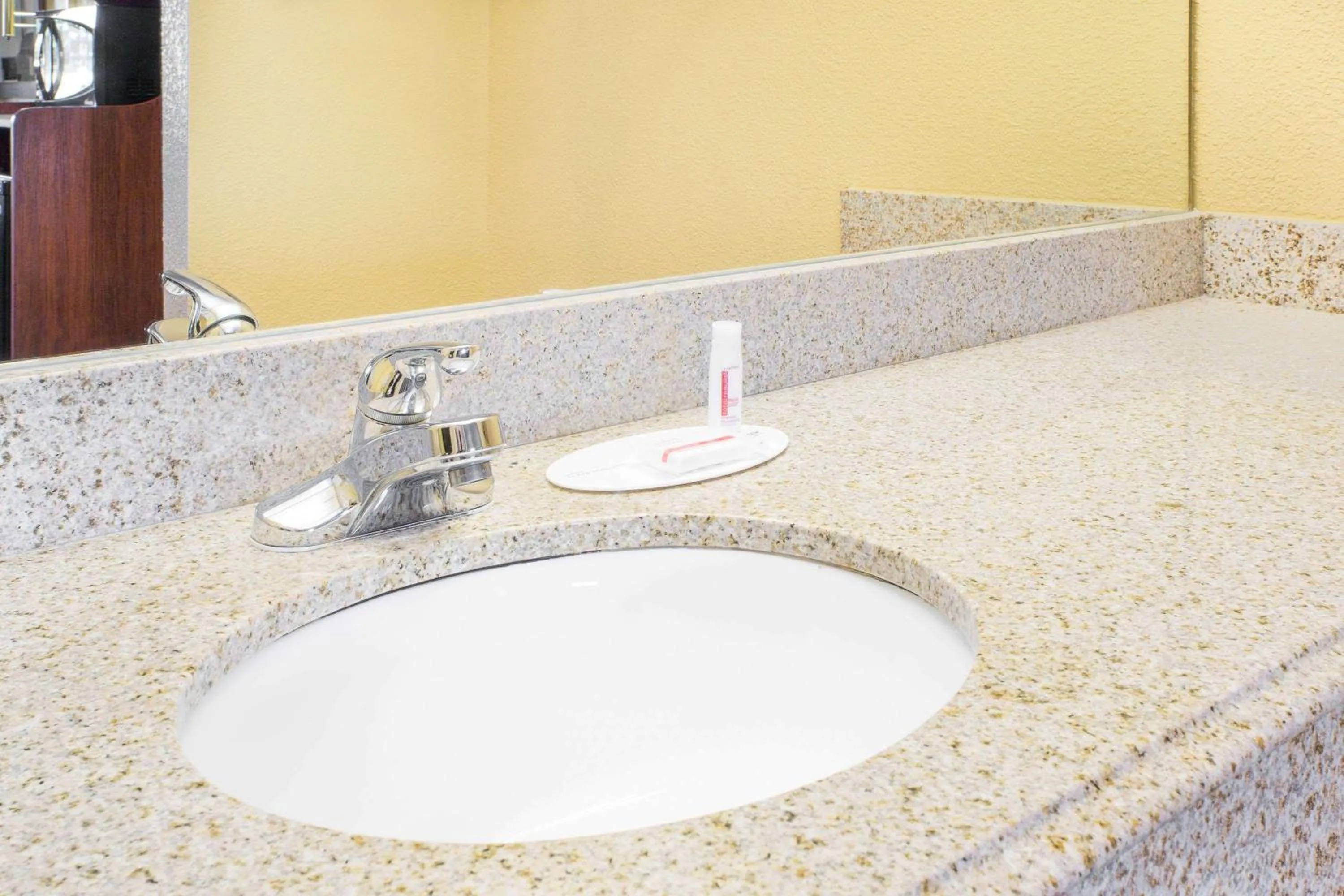 Bathroom in Days Inn by Wyndham N Little Rock East