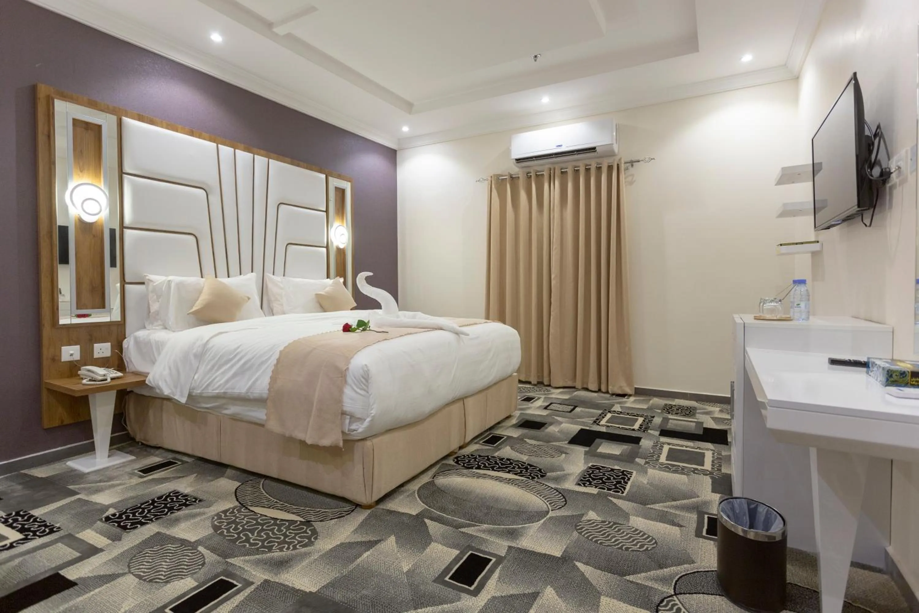 Bed in Dior Inn serviced apartments