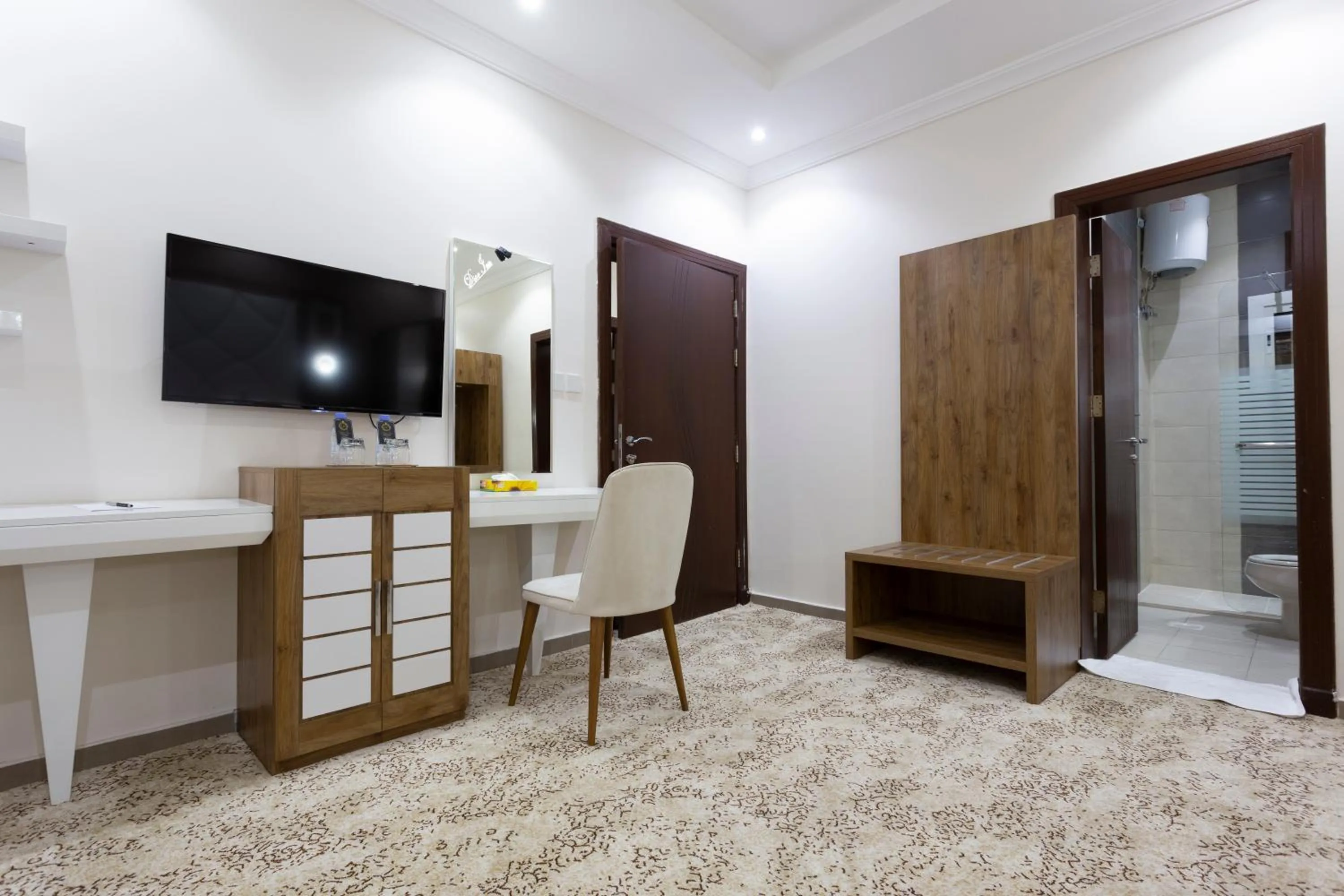TV and multimedia in Dior Inn serviced apartments