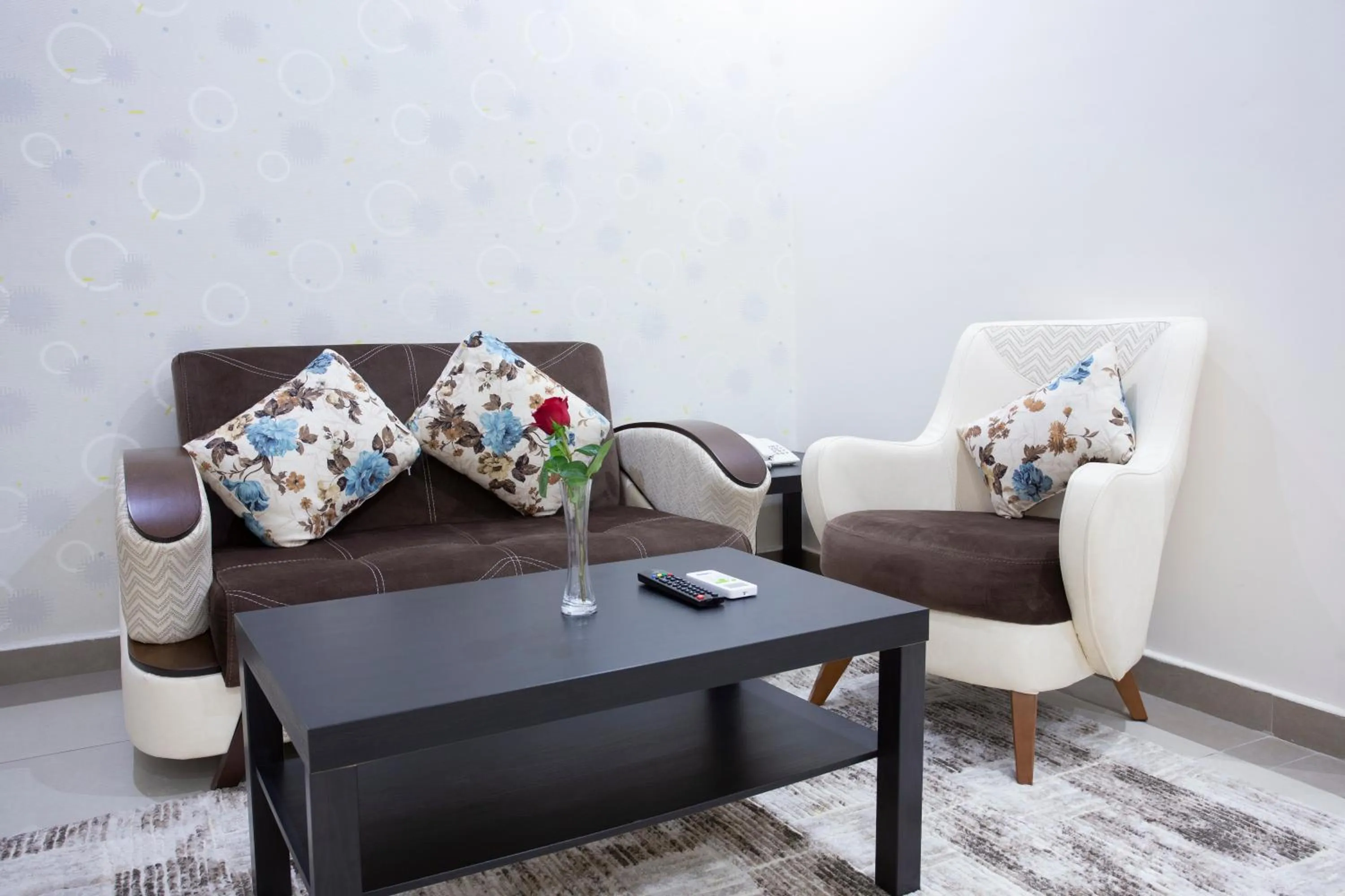 Seating area in Dior Inn serviced apartments