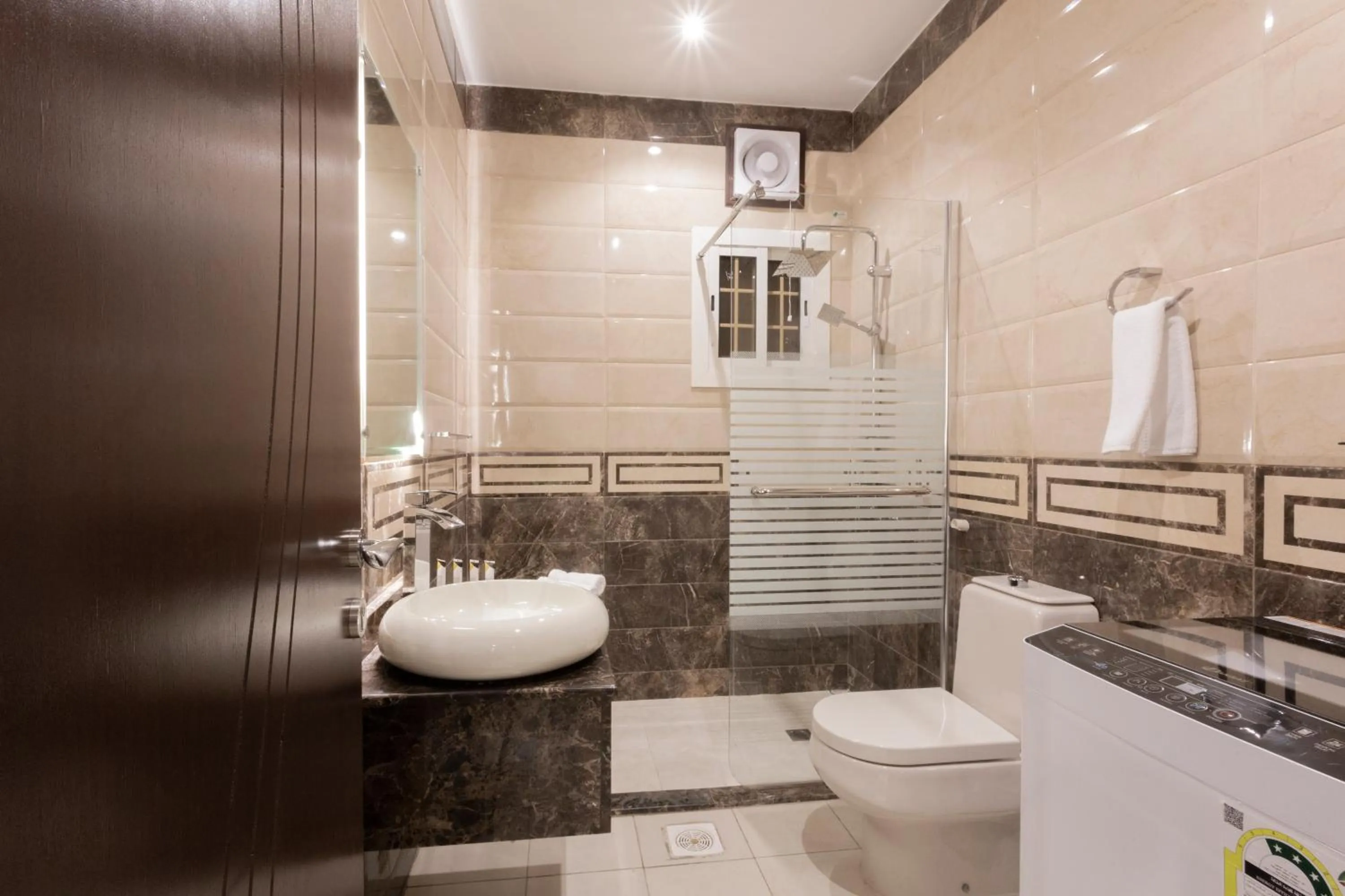 Toilet in Dior Inn serviced apartments