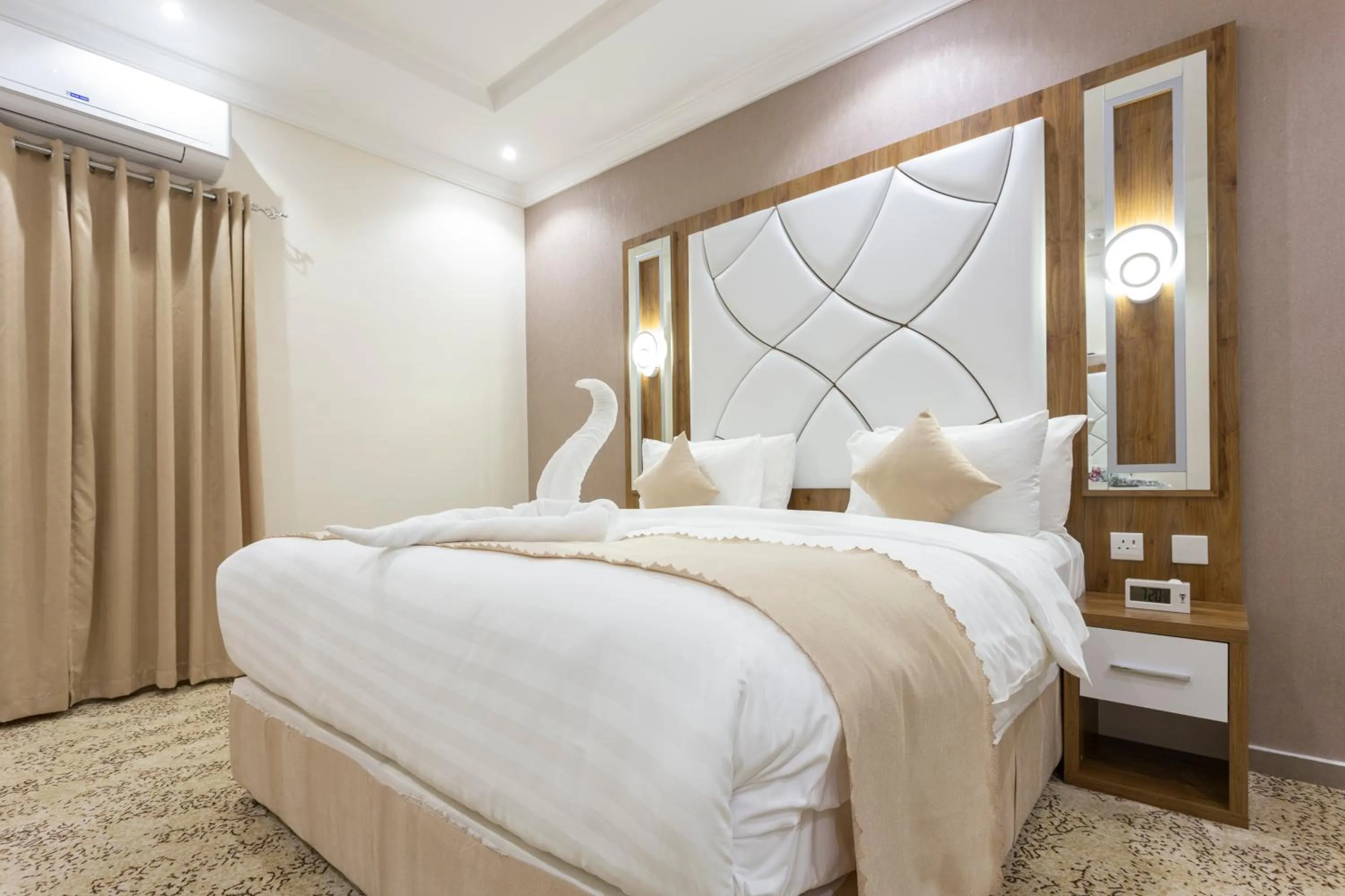 Bed in Dior Inn serviced apartments