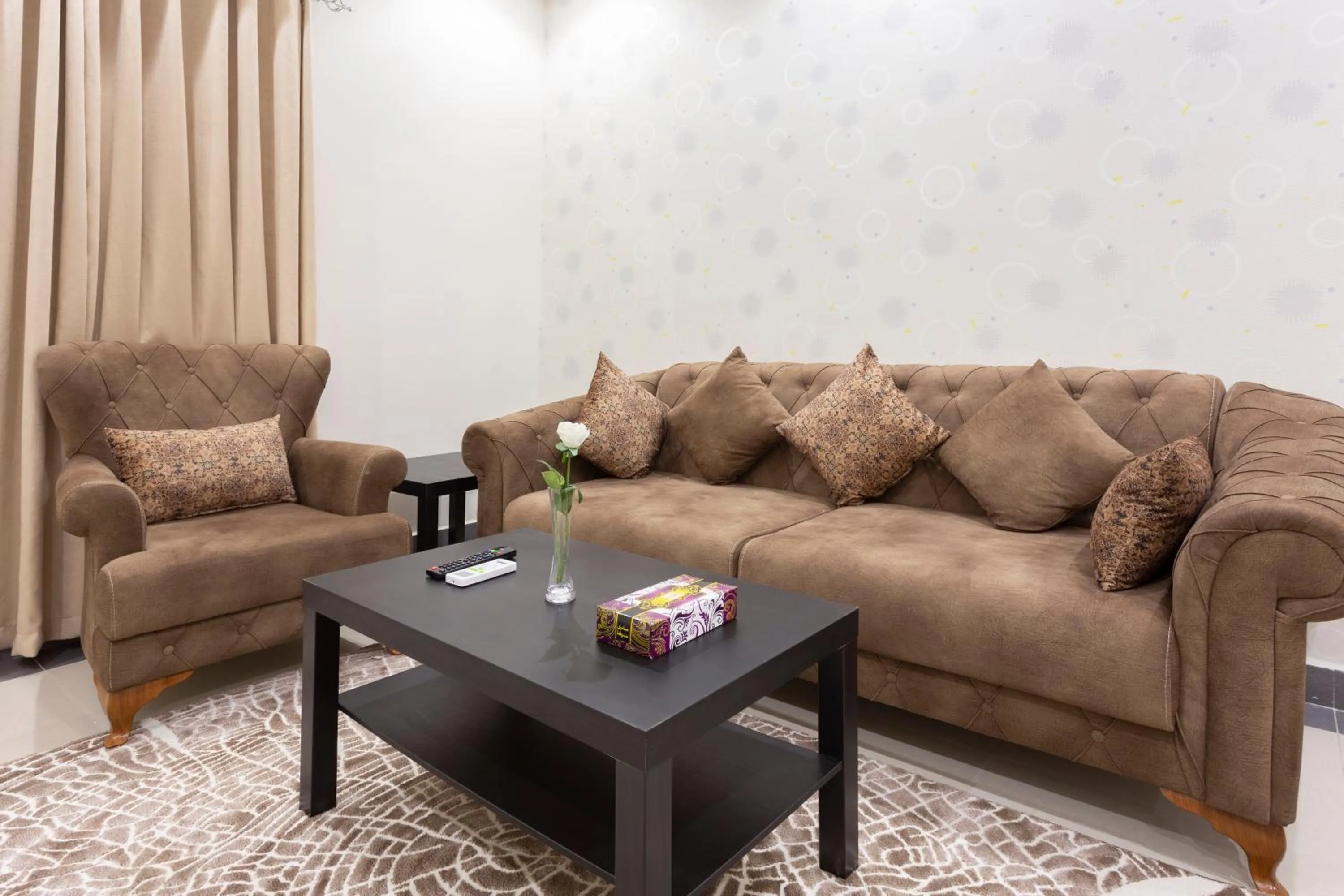 Seating area in Dior Inn serviced apartments
