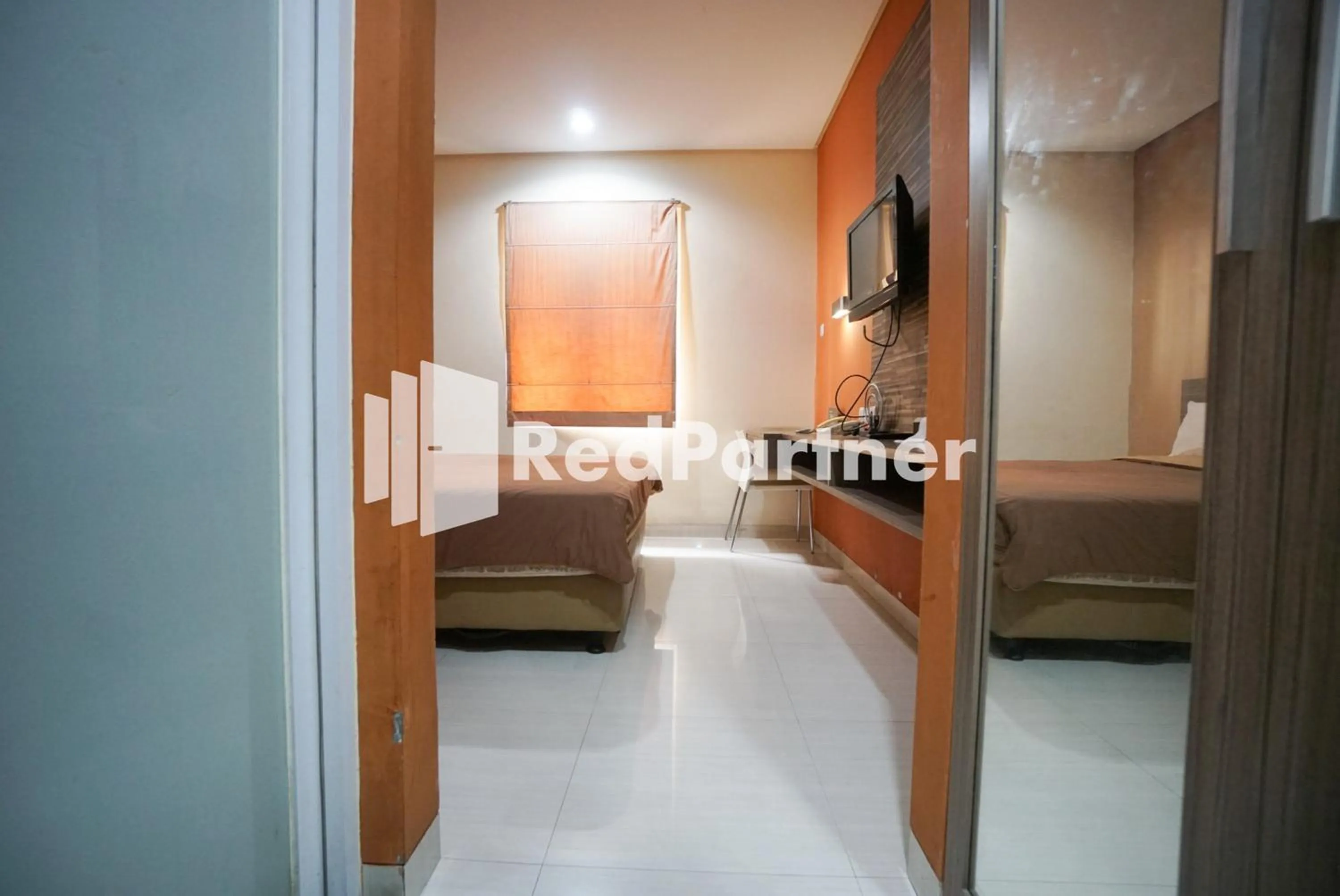 Bedroom in Tirta Mansion Lippo Karawaci Mitra RedDoorz