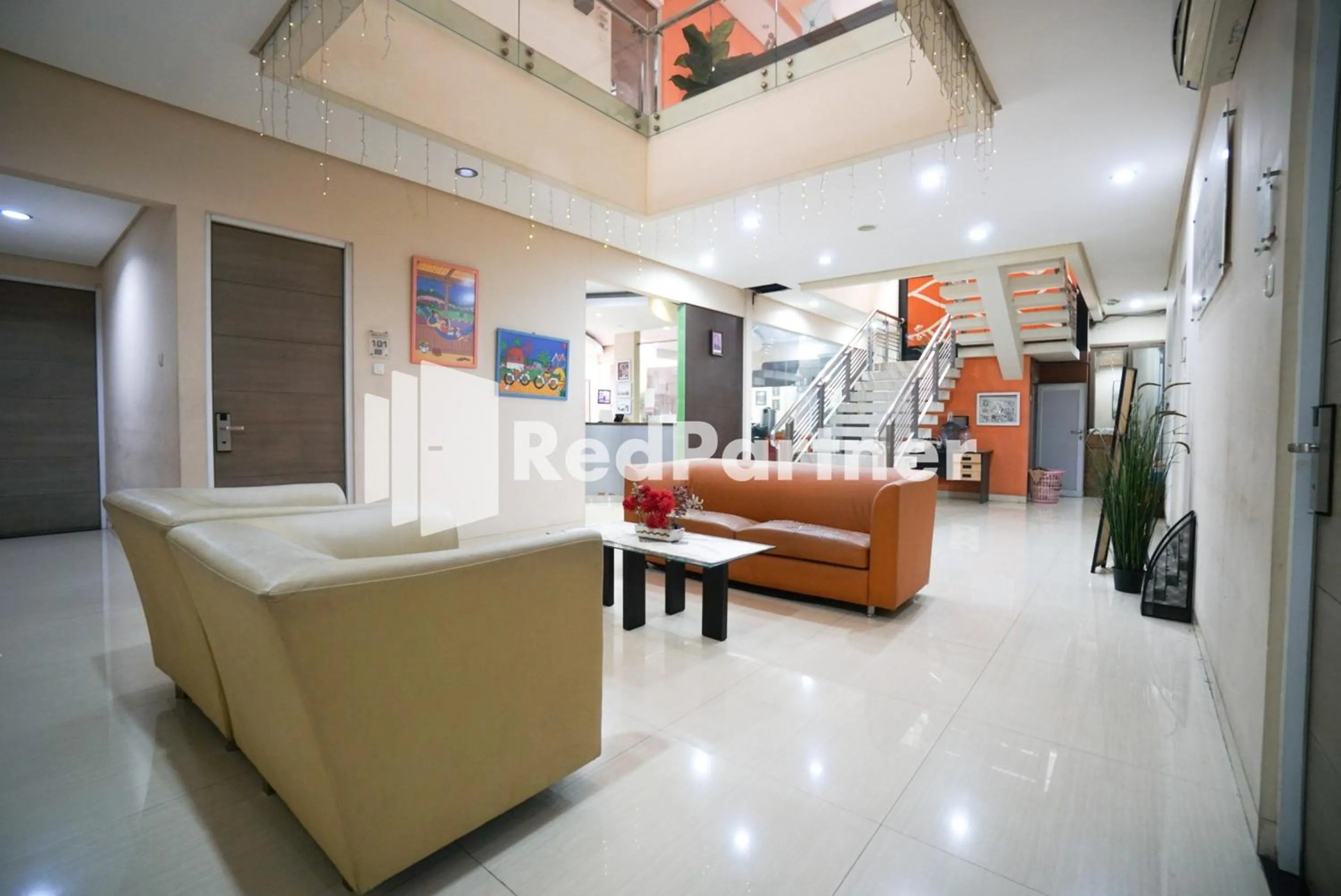 Living room in Tirta Mansion Lippo Karawaci Mitra RedDoorz