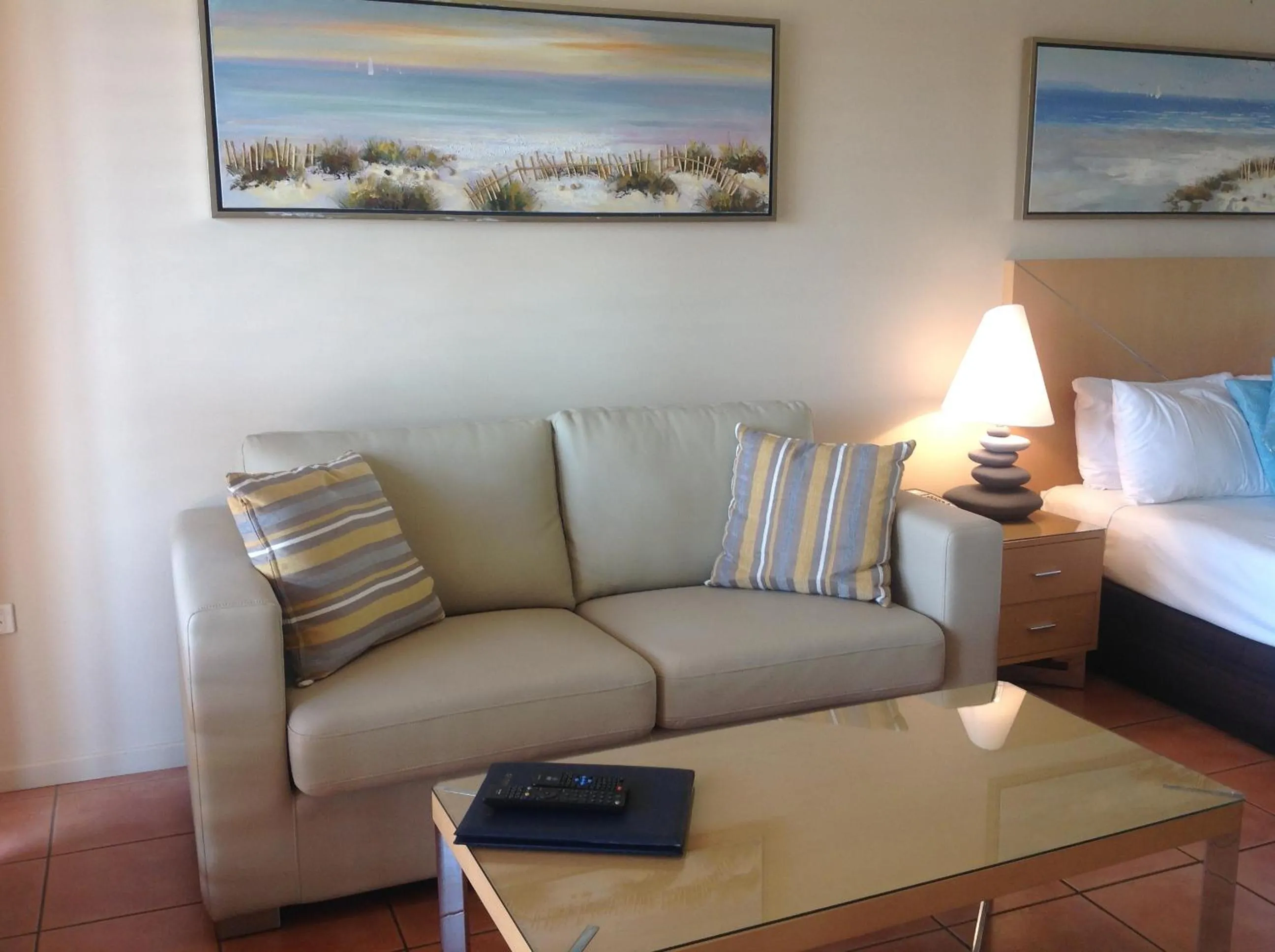 Living room, Bed in at Boathaven Bay Holiday Apartments