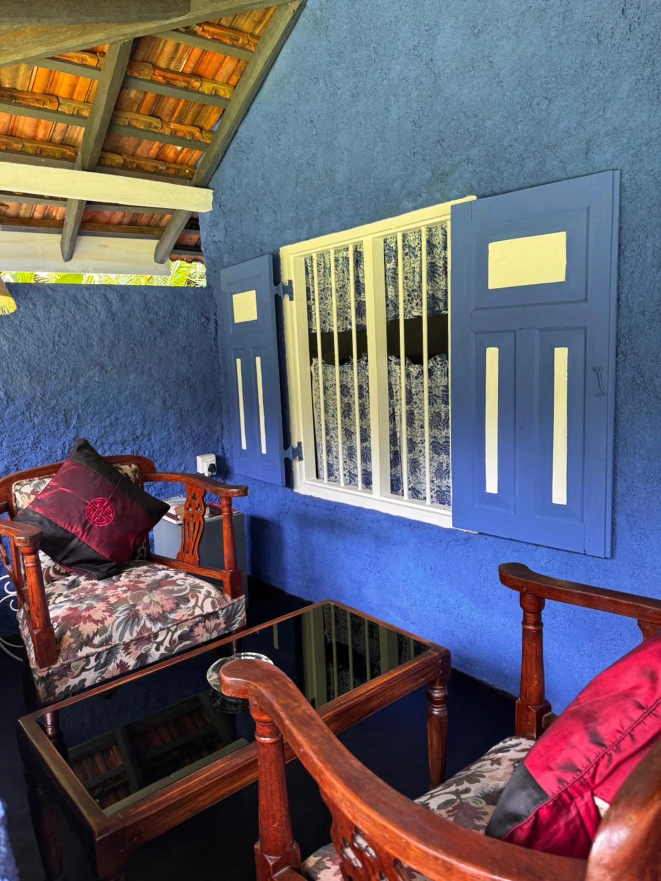 Seating area in The Kandyan Manor by Bhathiya & Suzy
