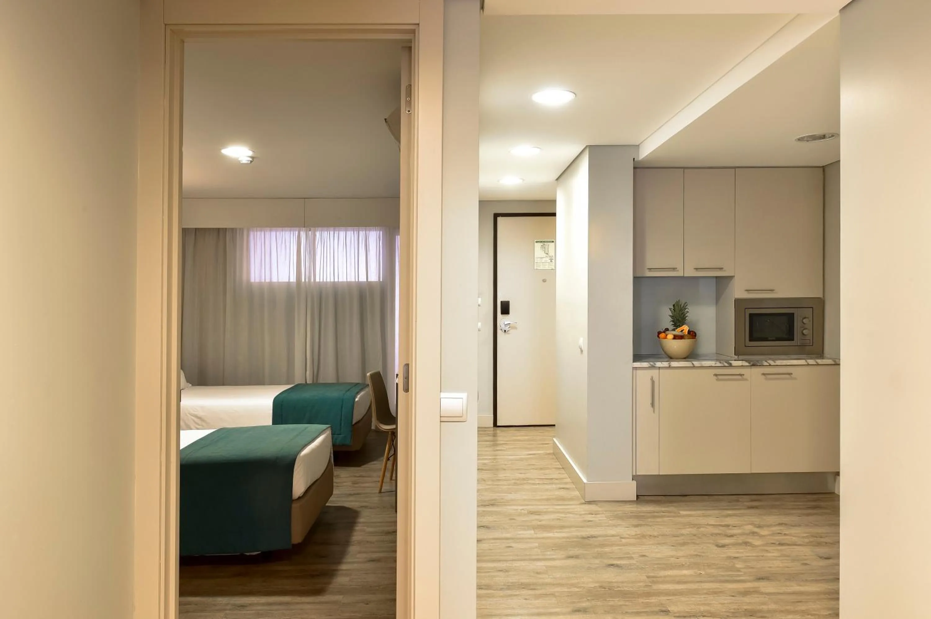 Kitchen or kitchenette, Bed in Aqualuz Lagos by The Editory