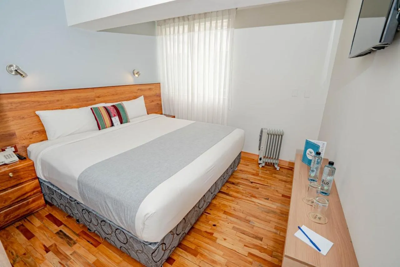 Bed in Muru Homely Hotel Cusco