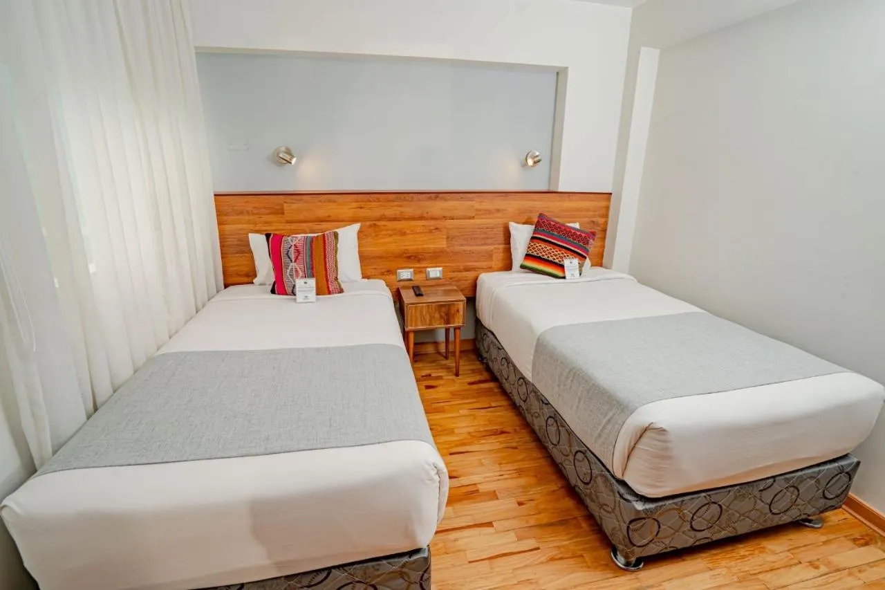 Bed in Muru Homely Hotel Cusco