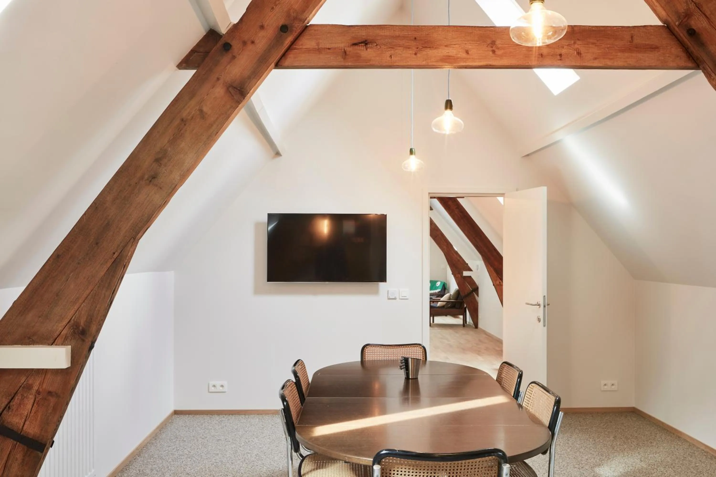 Communal lounge/ TV room in B&B De Deugdzonde