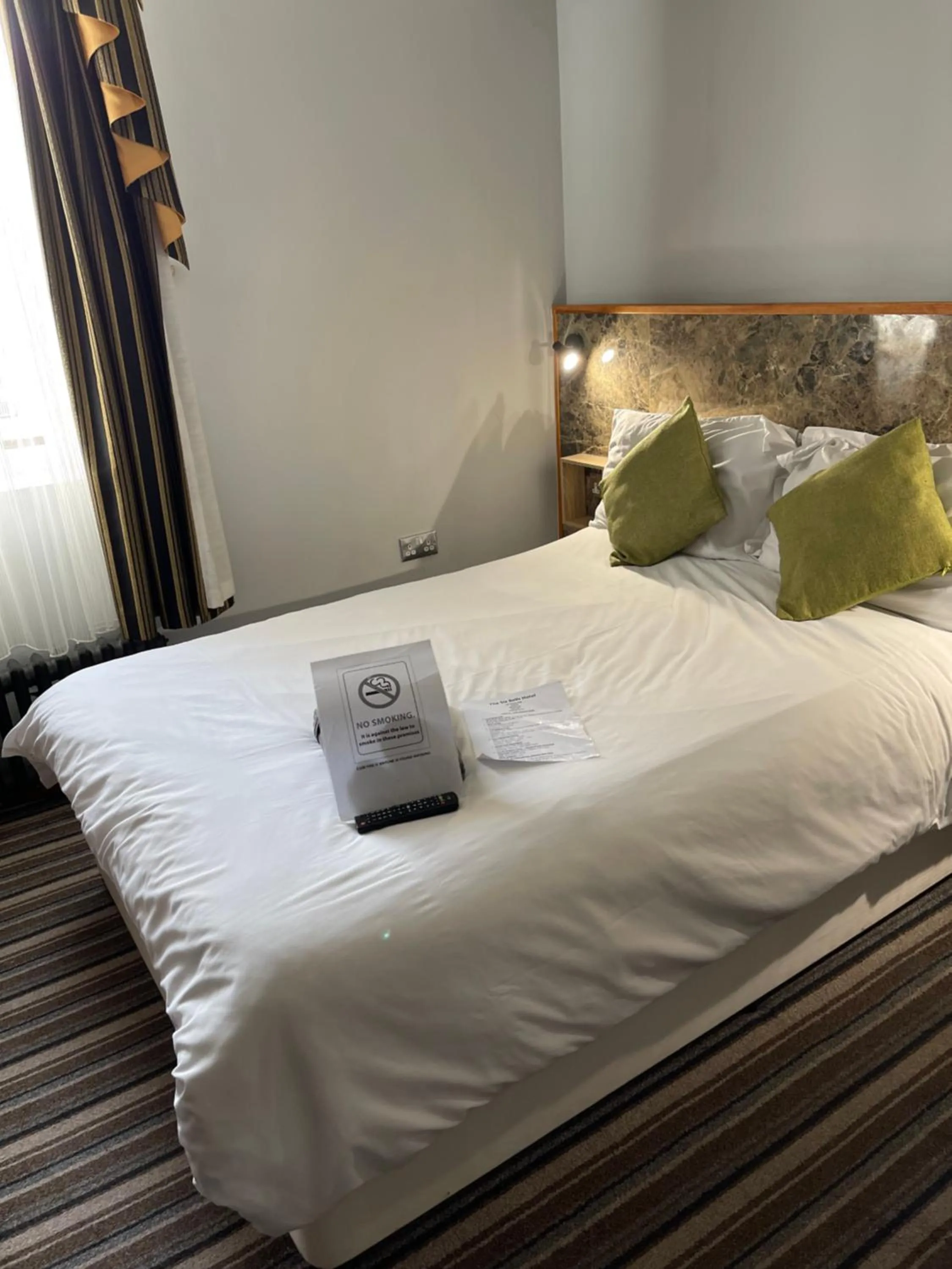 Bed in The Six Bells Hotel