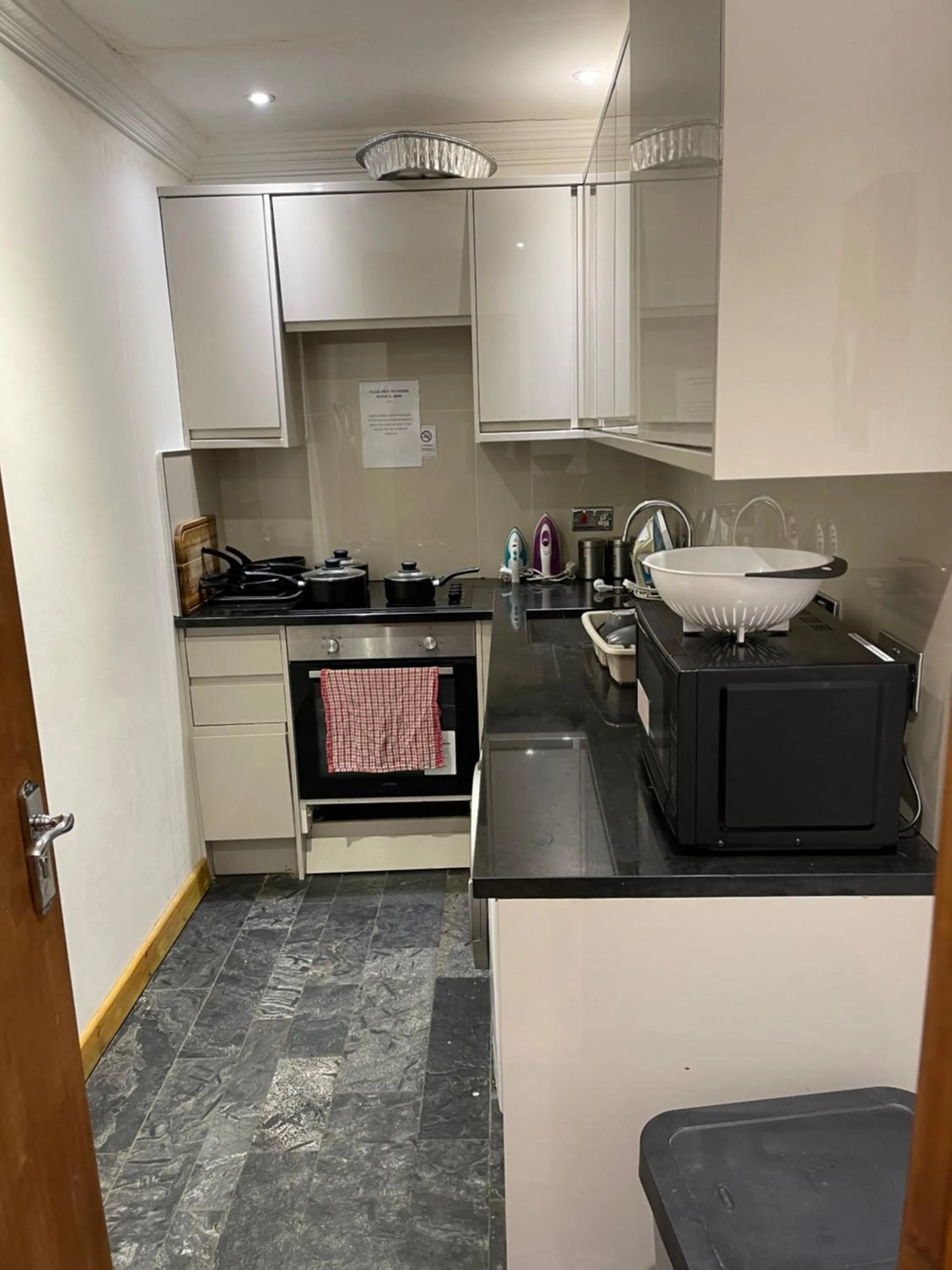 Communal kitchen in The Six Bells Hotel