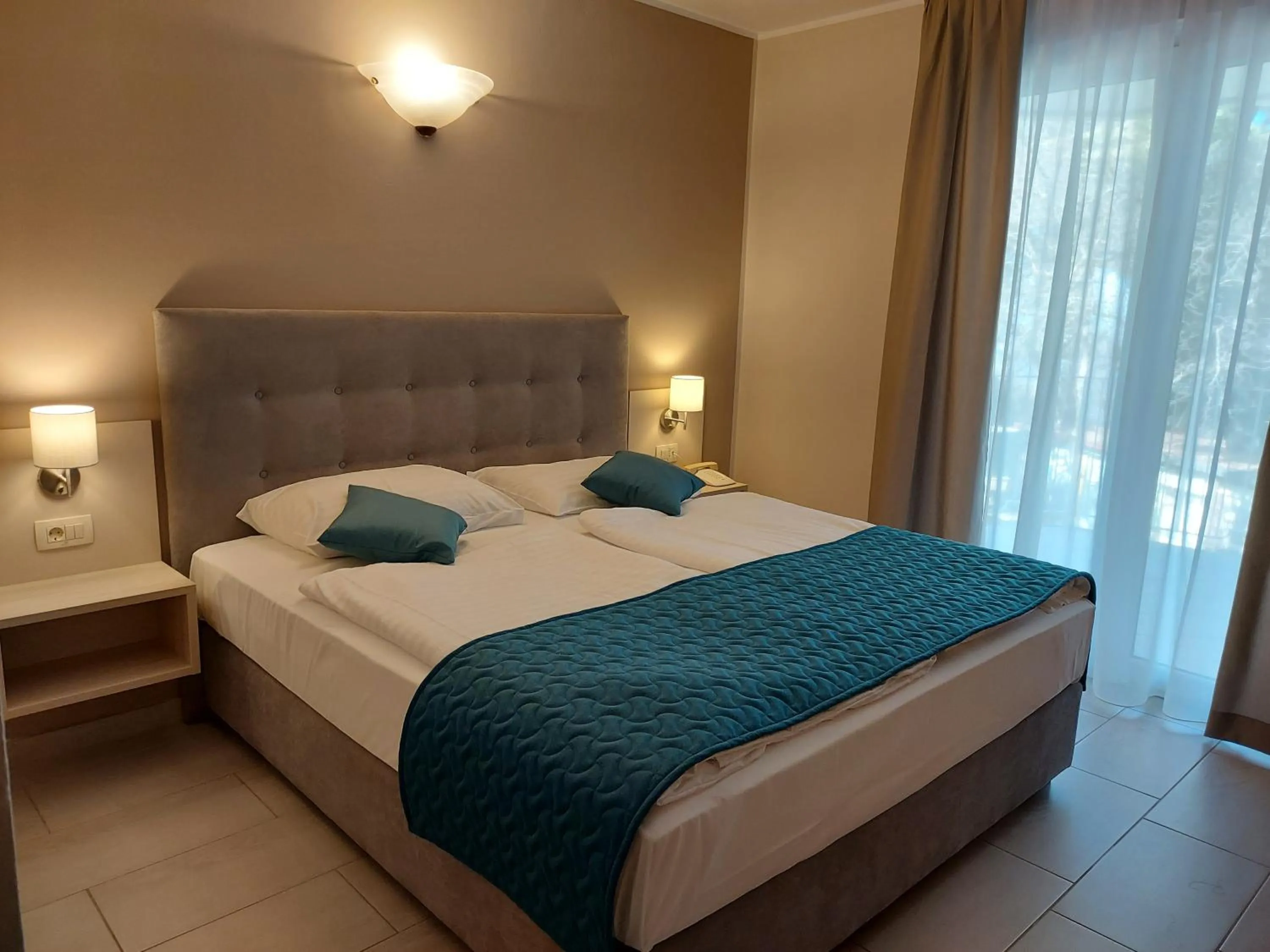 Bed in Belvedere Resort Hotels