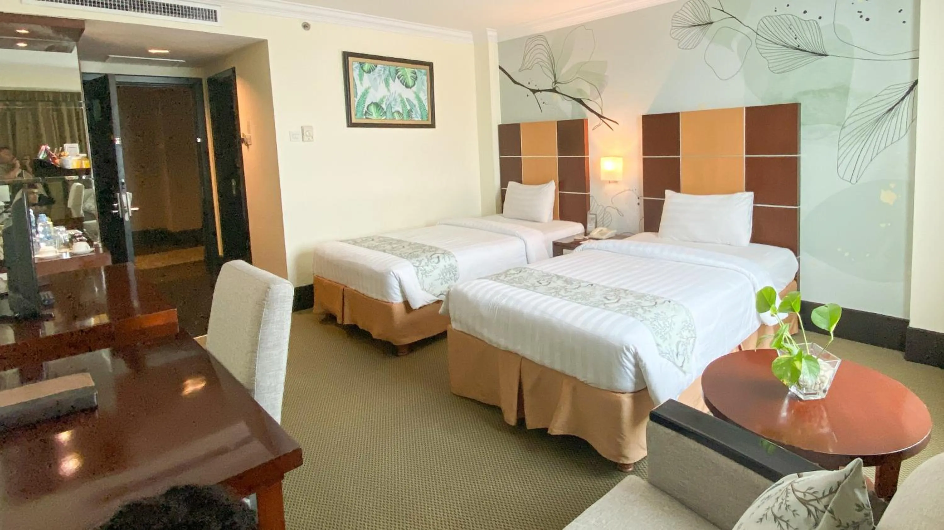 Bed in Emerald Garden International Hotel