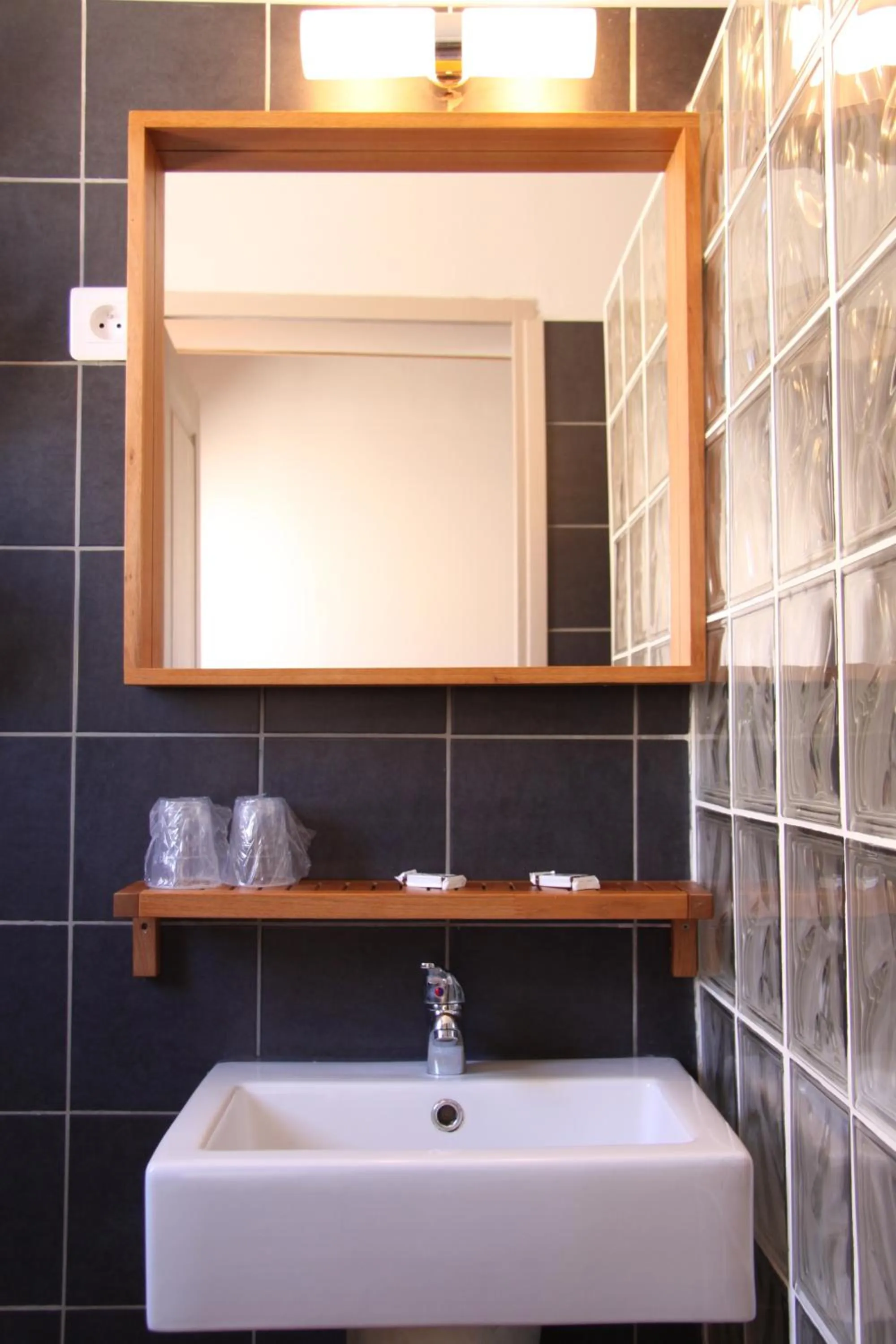 Bathroom in Hôtel et Résidence Benista