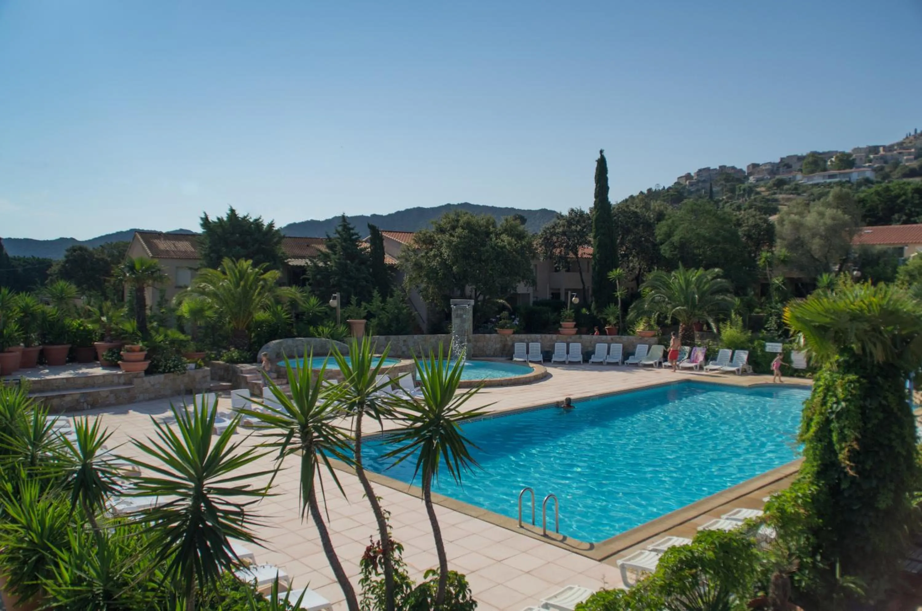 Swimming pool in Hôtel et Résidence Benista