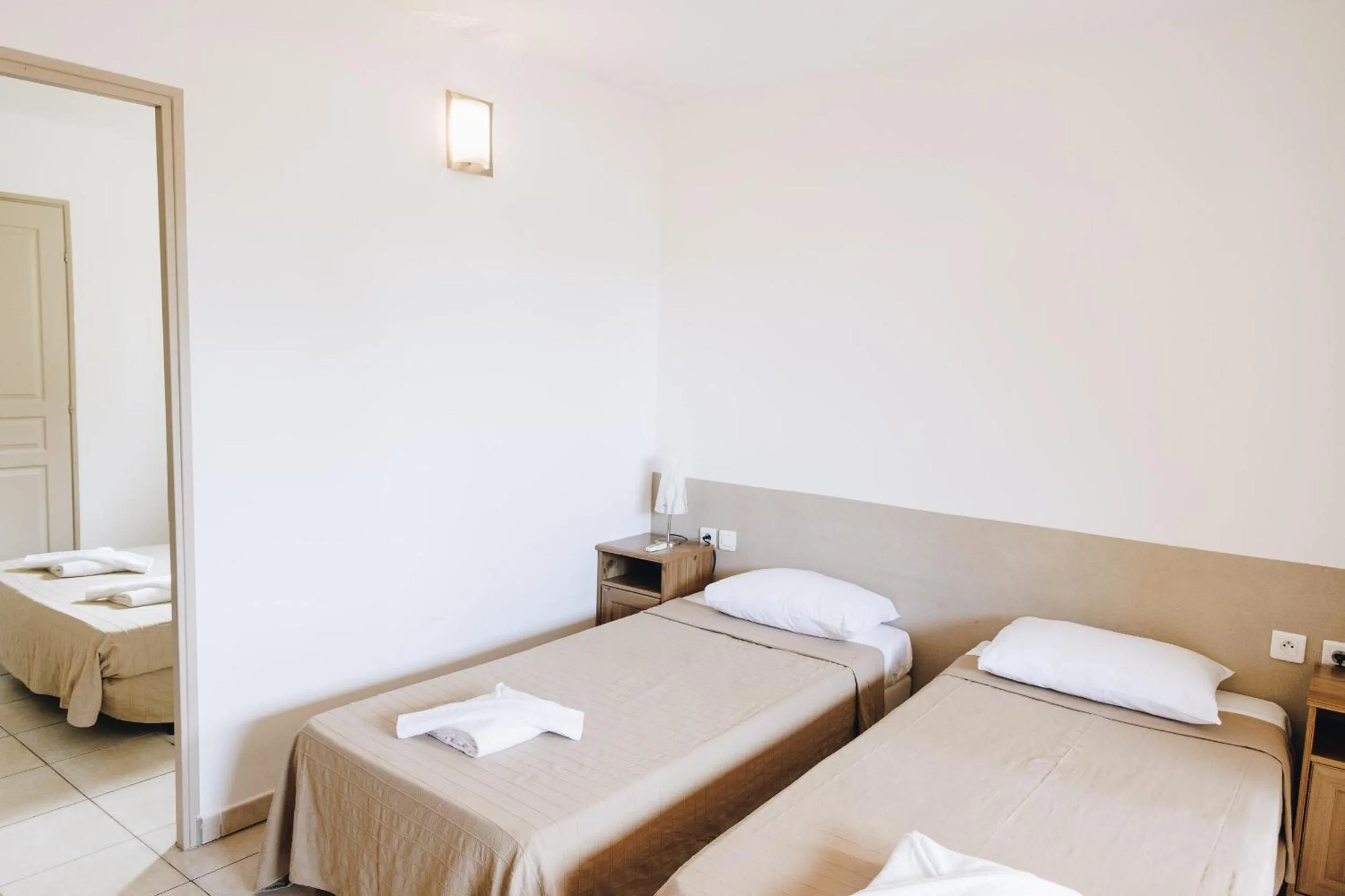 Bedroom, Bed in Hôtel et Résidence Benista