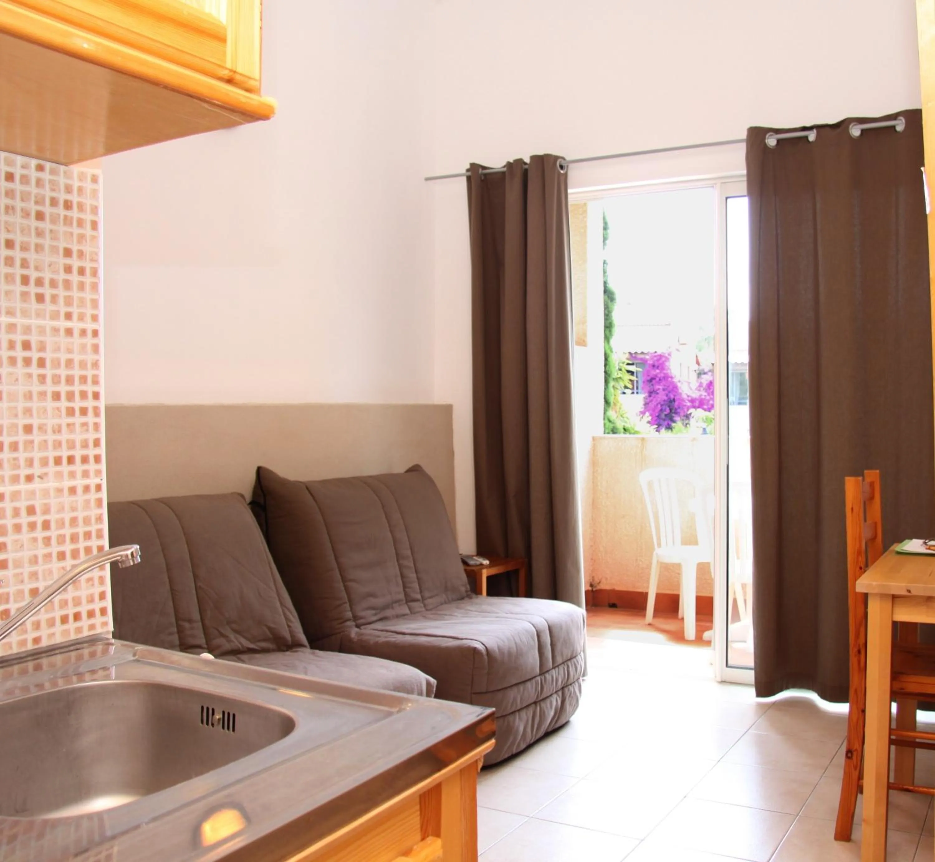 Living room in Hôtel et Résidence Benista