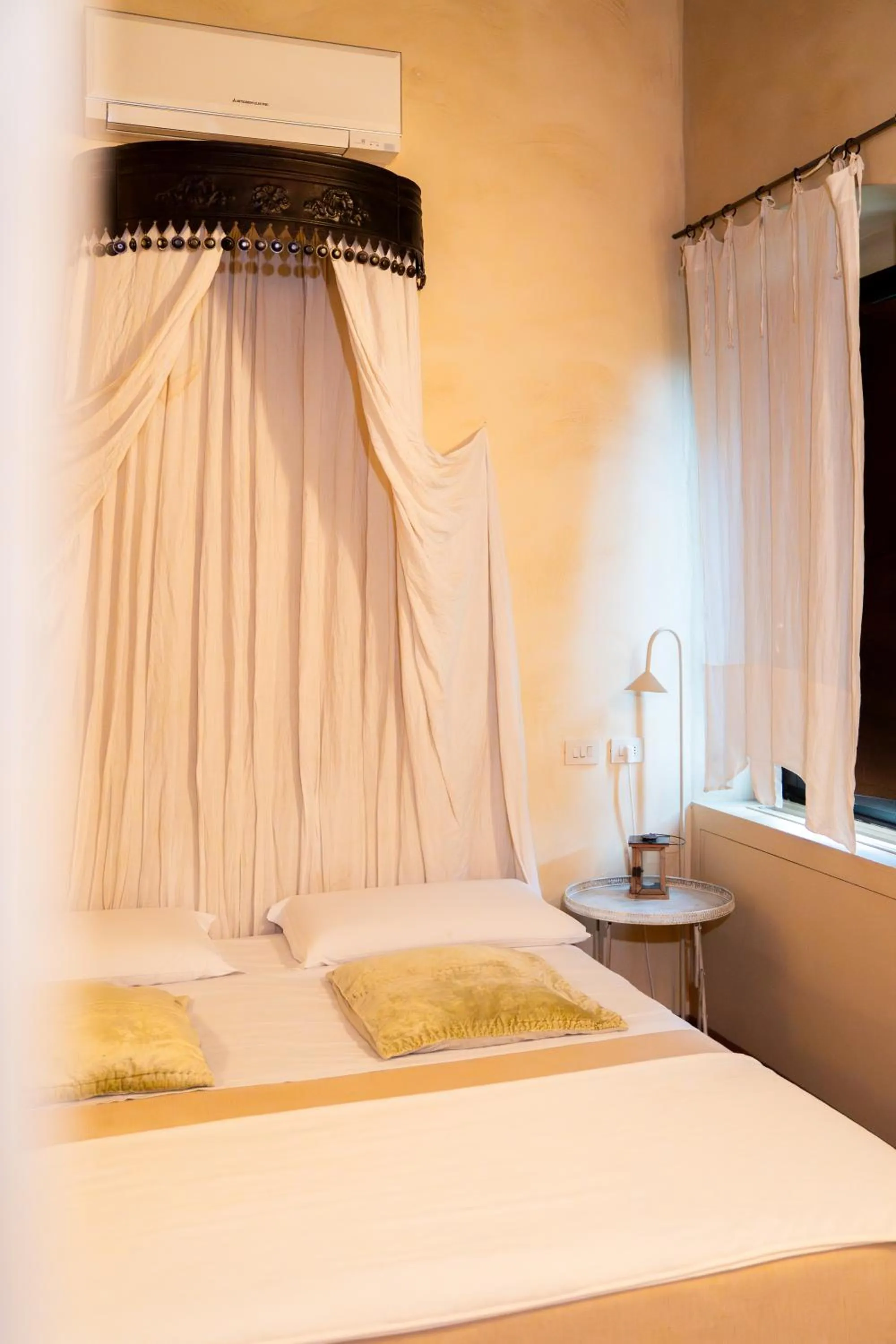 Bed in Cappuccini Resort