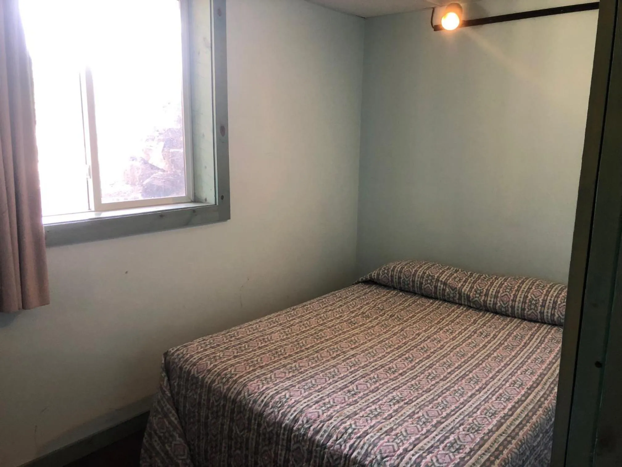 Bedroom in Black Hills Cabins at Quail's Crossing