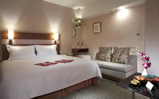 Bed in Hua Ge Hot Spring Hotel