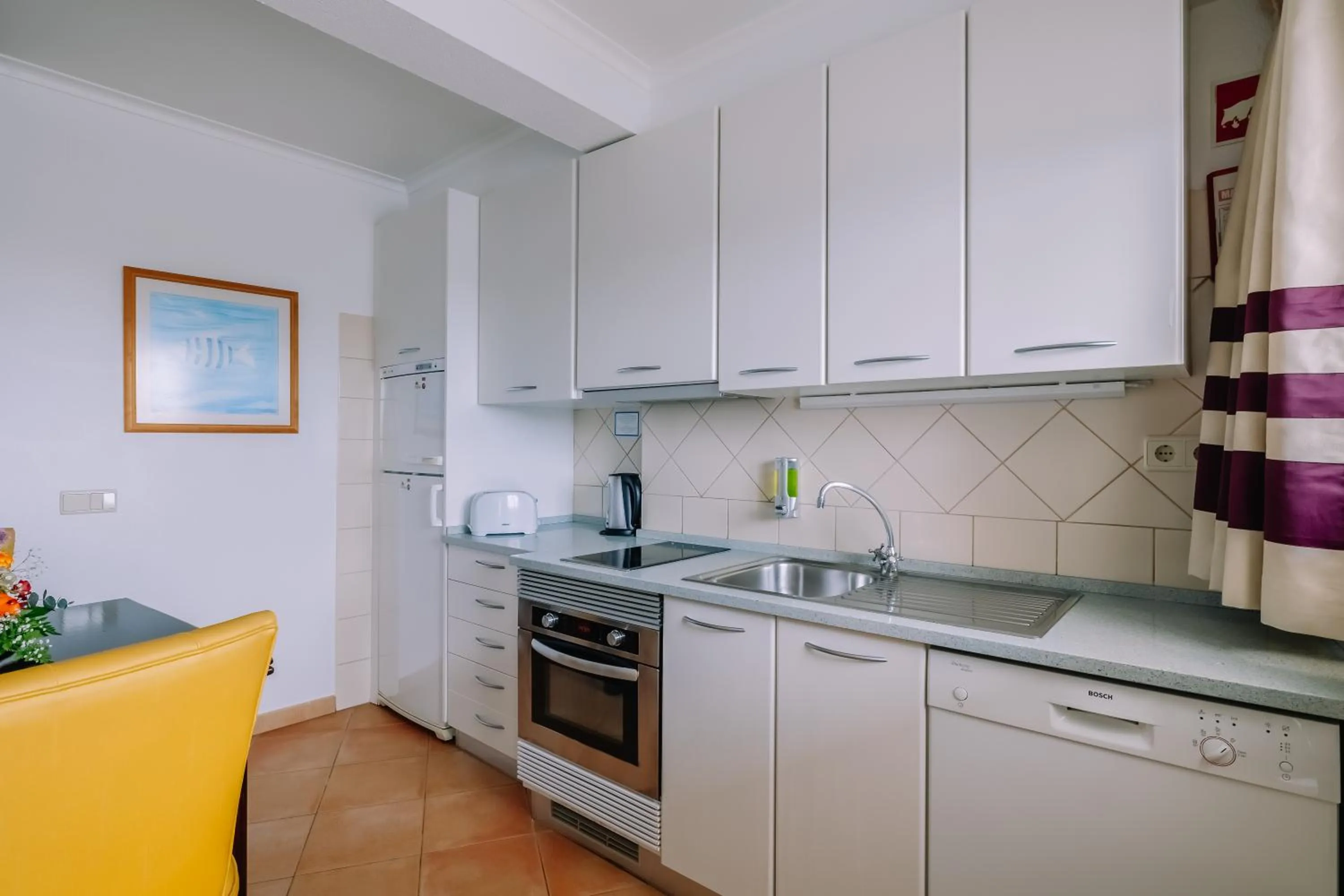 Bedroom in Grand Muthu Oura View Beach Club