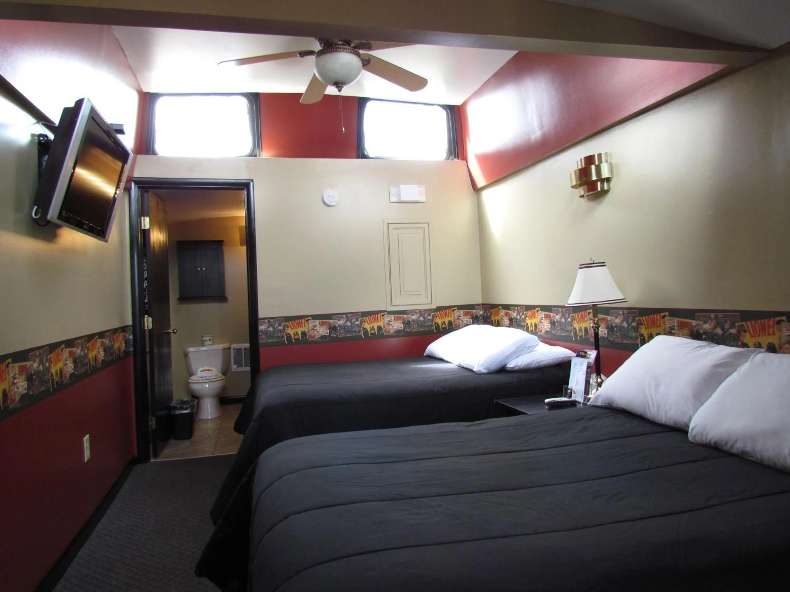 Bed in Red Caboose Motel & Restaurant