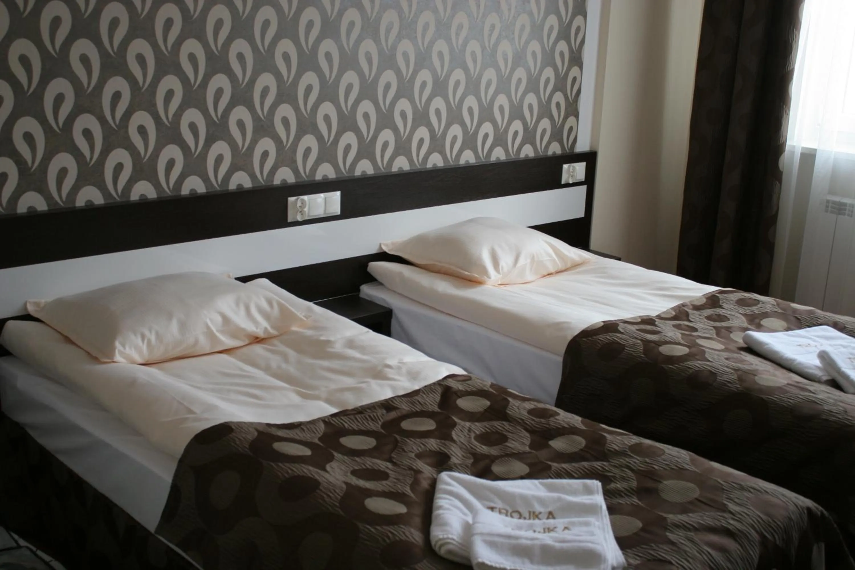 Bed in Hotel Trojka