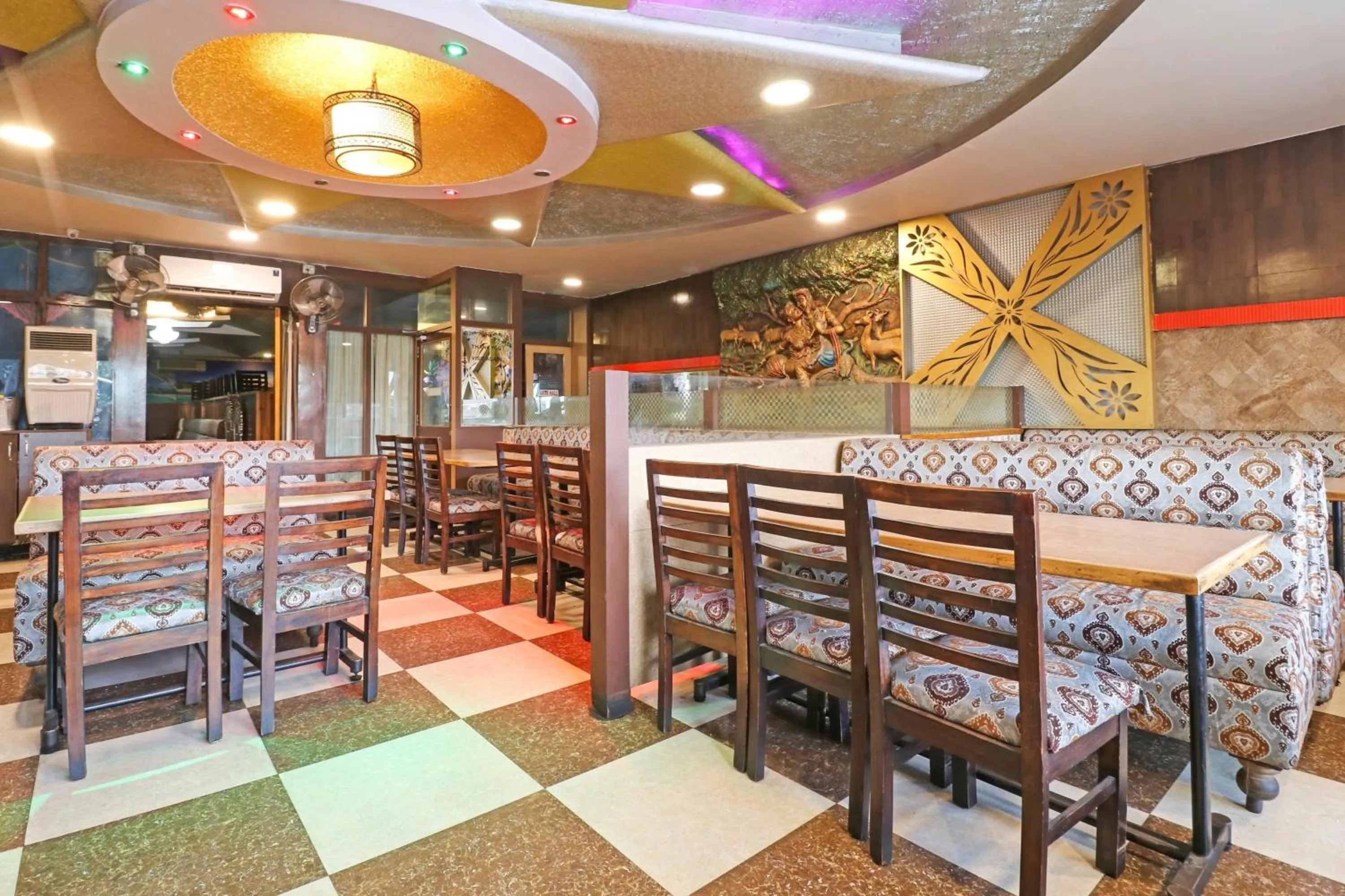 Dining area in Collection O Madhura Residency