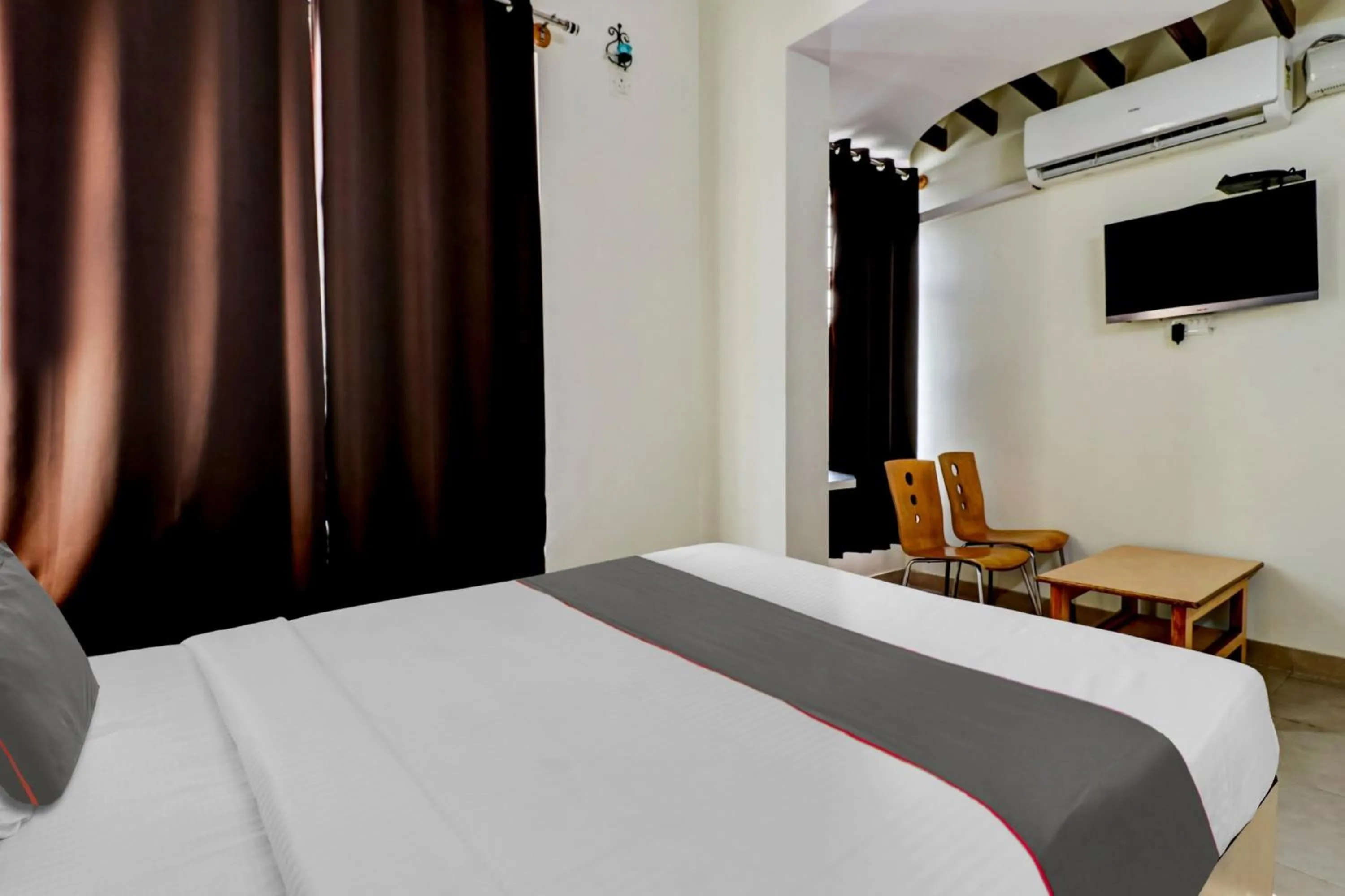 Bathroom, Bed in Collection O Madhura Residency