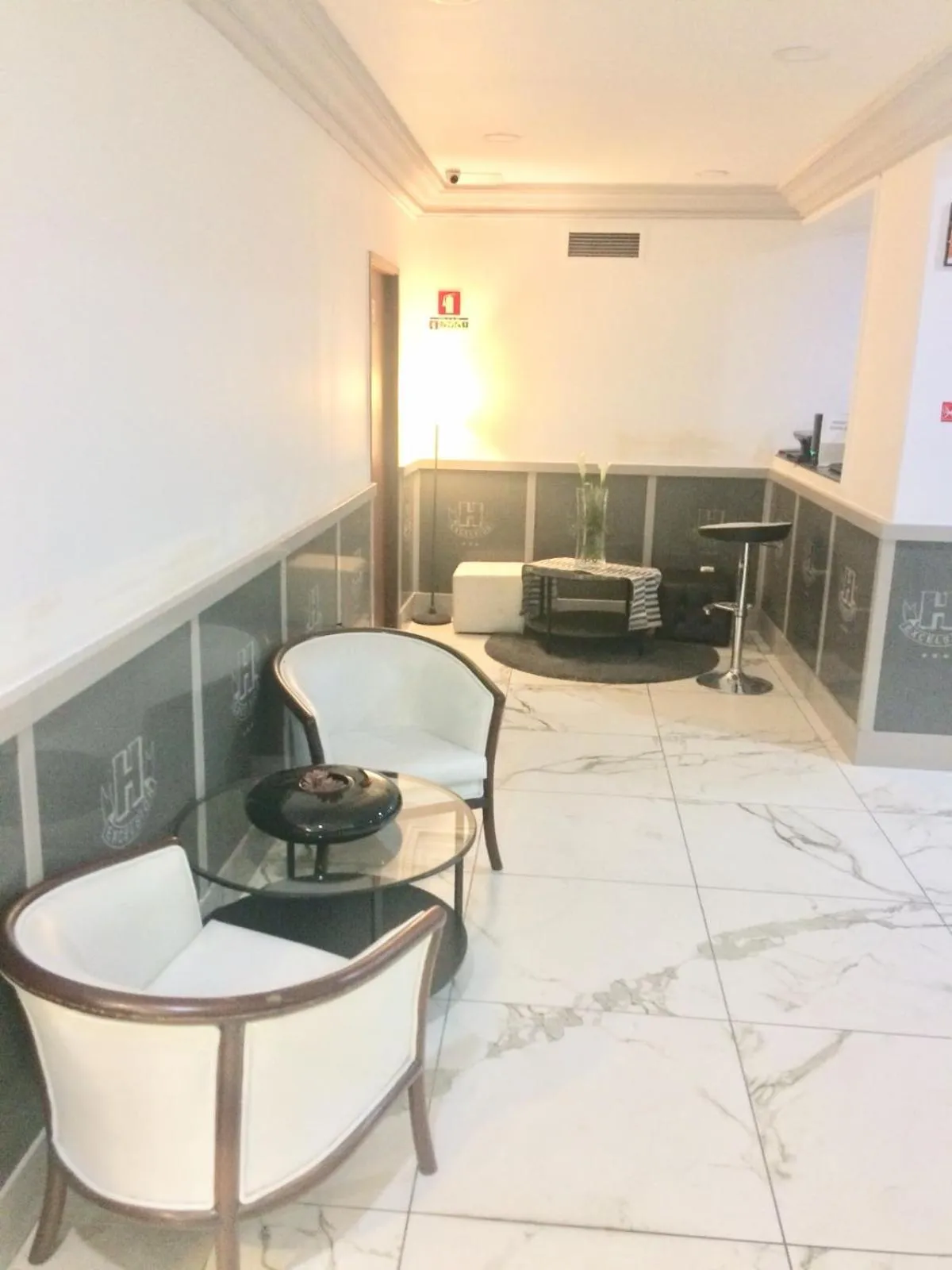 Communal lounge/ TV room in Hotel Excelsior