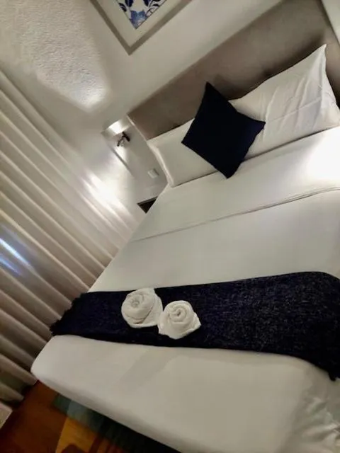 Bed in Hotel Excelsior