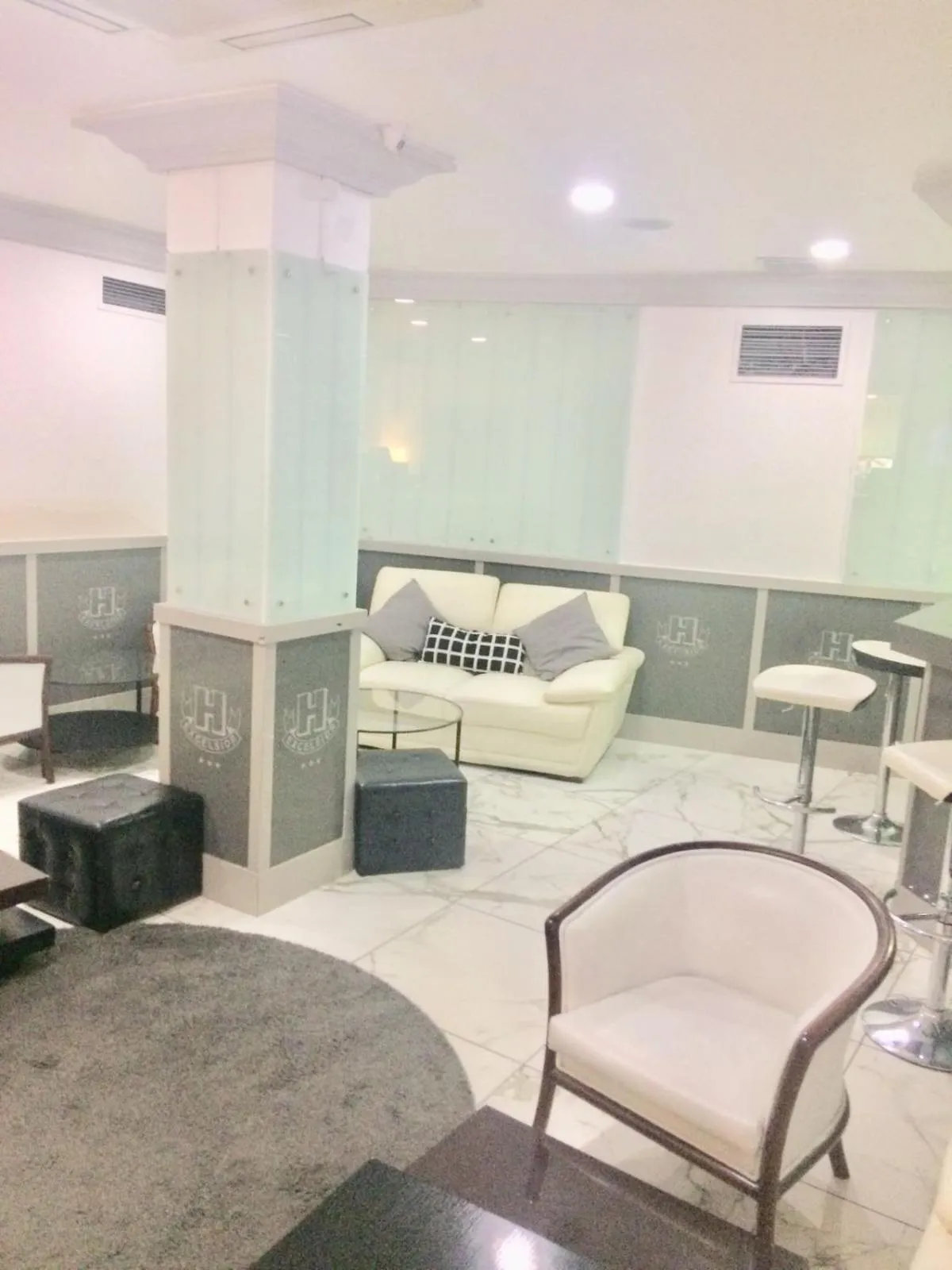 Communal lounge/ TV room in Hotel Excelsior