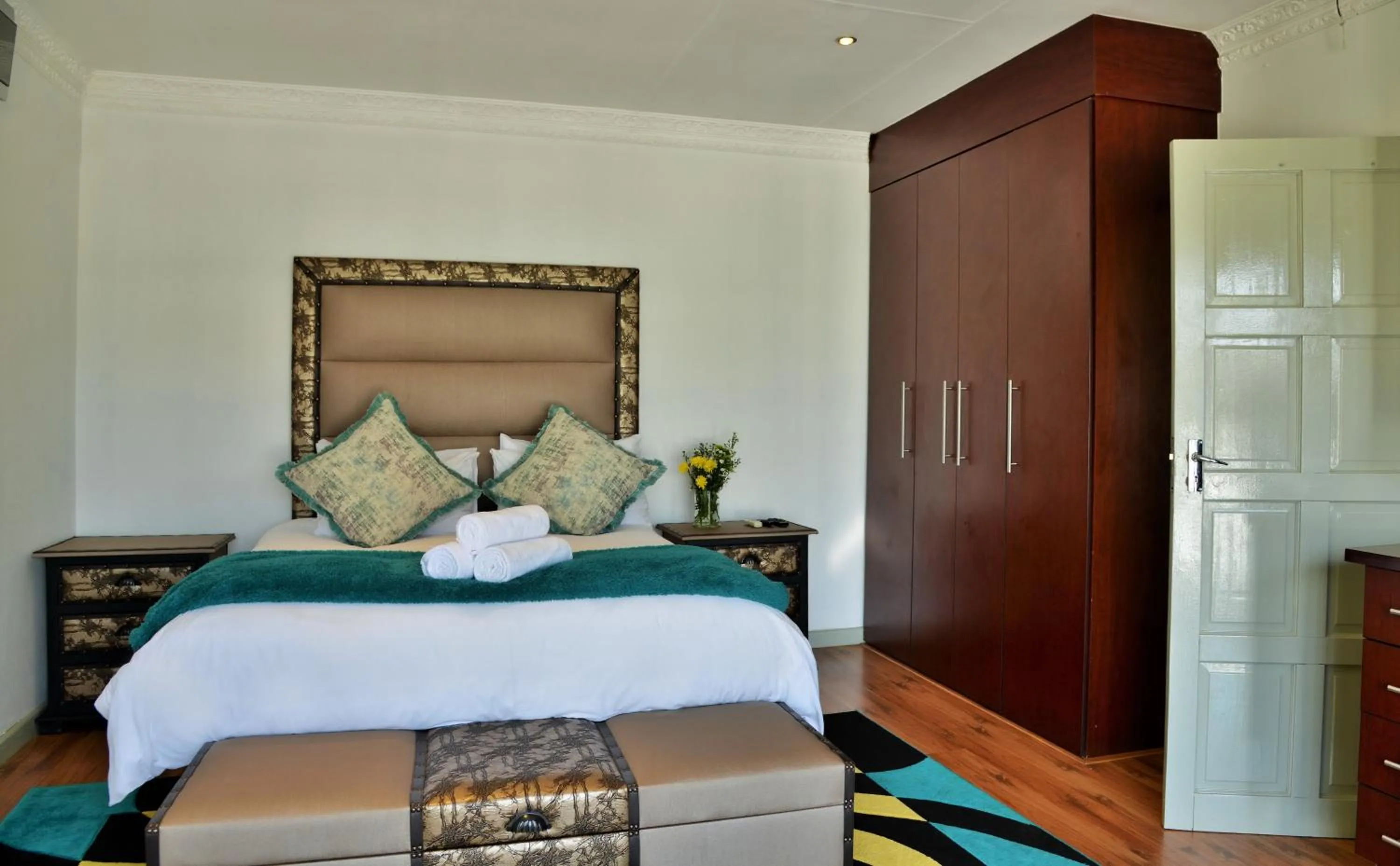 Bed in Indlovukazi Guesthouse