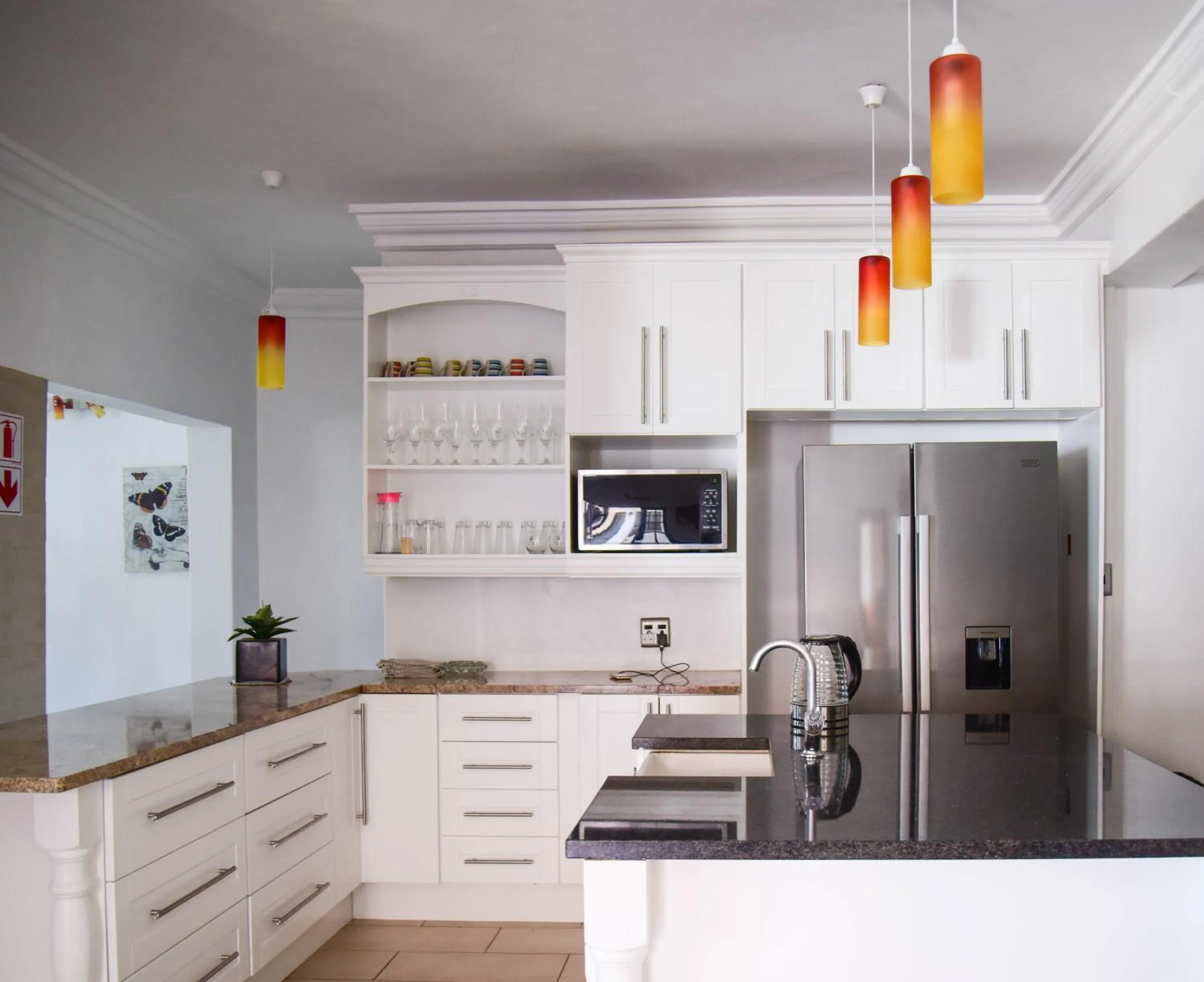 Kitchen or kitchenette in Indlovukazi Guesthouse