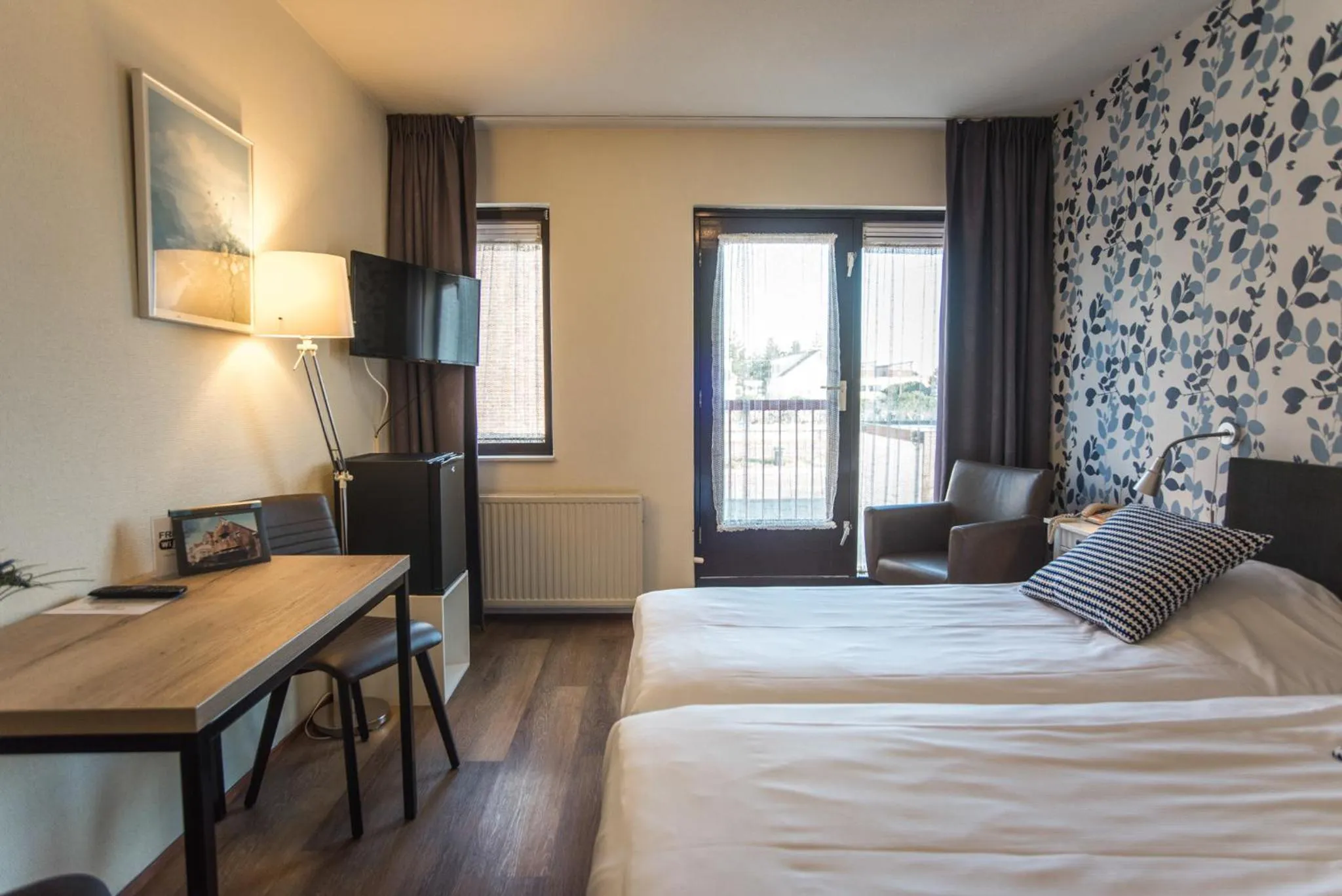 Seating area, Bed in Hotel Faber