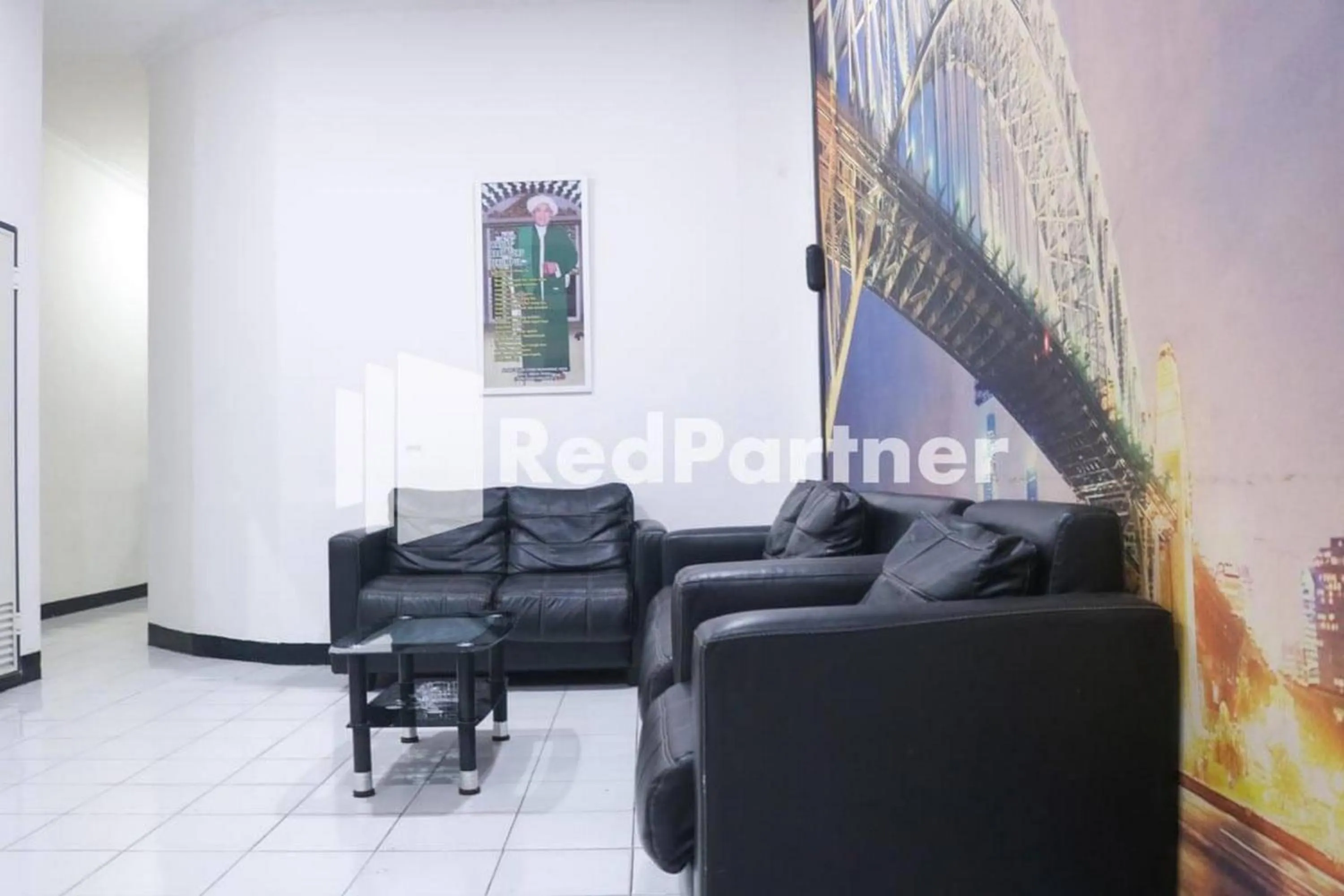 Seating area in Good Sleep Balikpapan Mitra RedDoorz