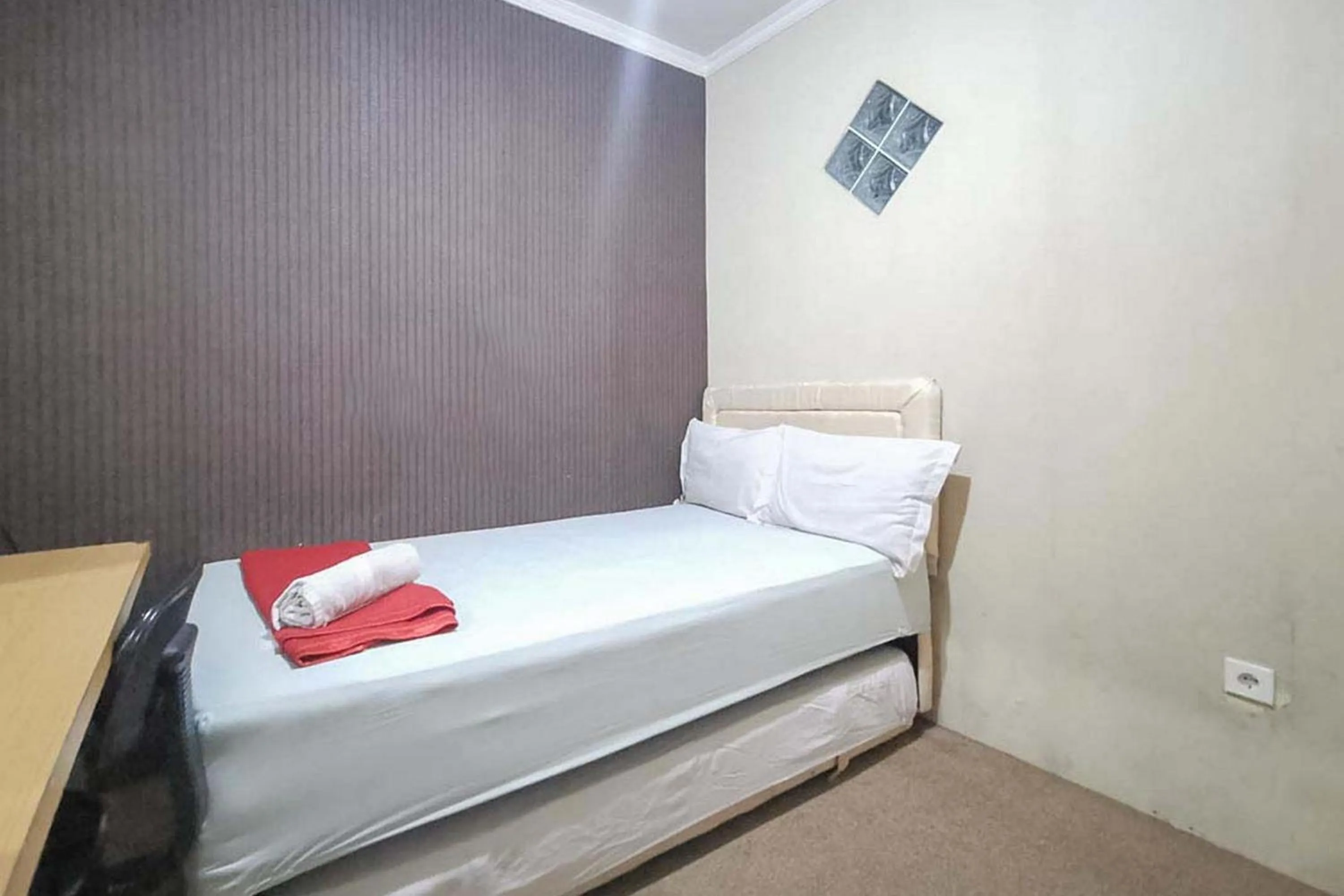 Bed in Good Sleep Balikpapan Mitra RedDoorz