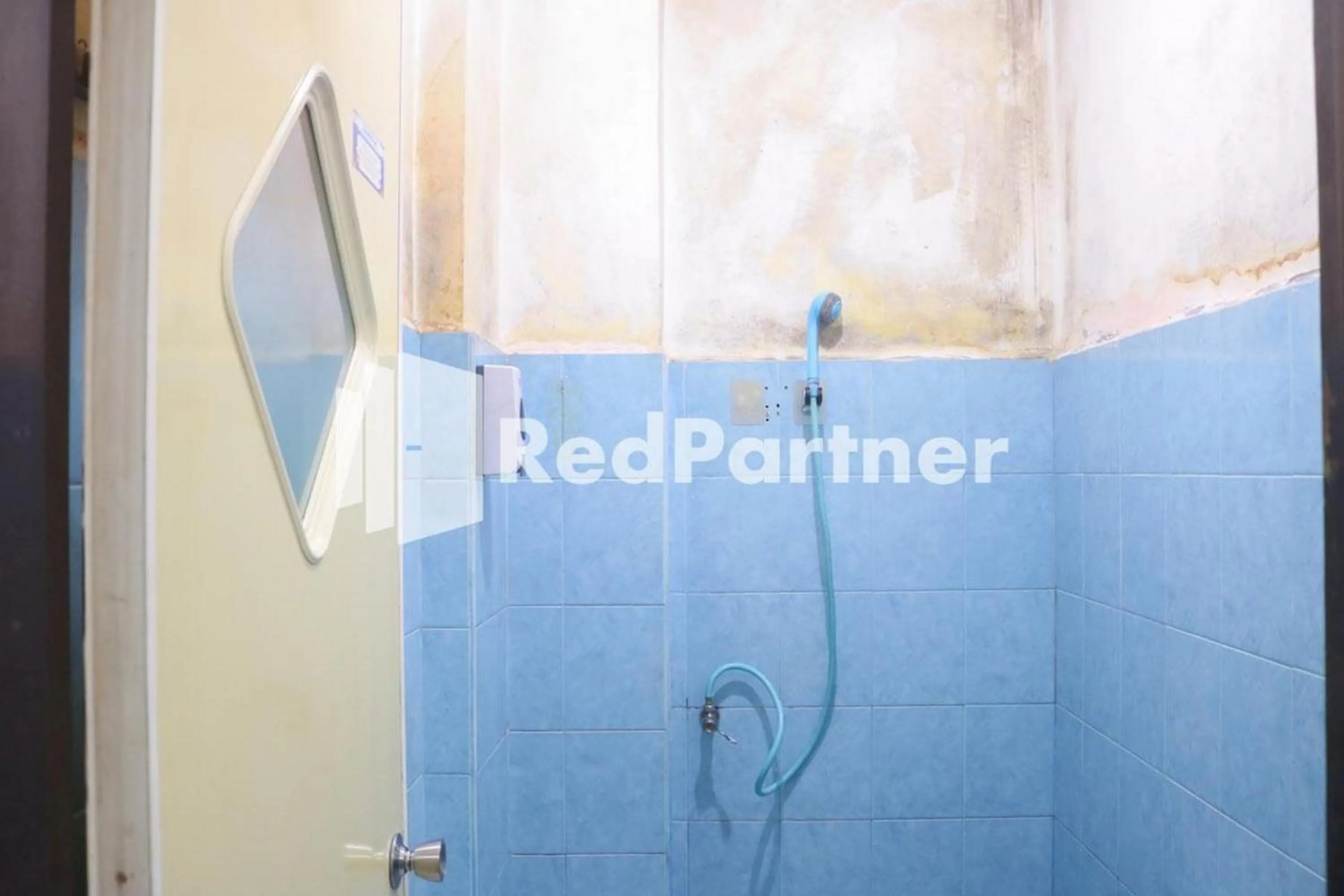 Bathroom in Good Sleep Balikpapan Mitra RedDoorz
