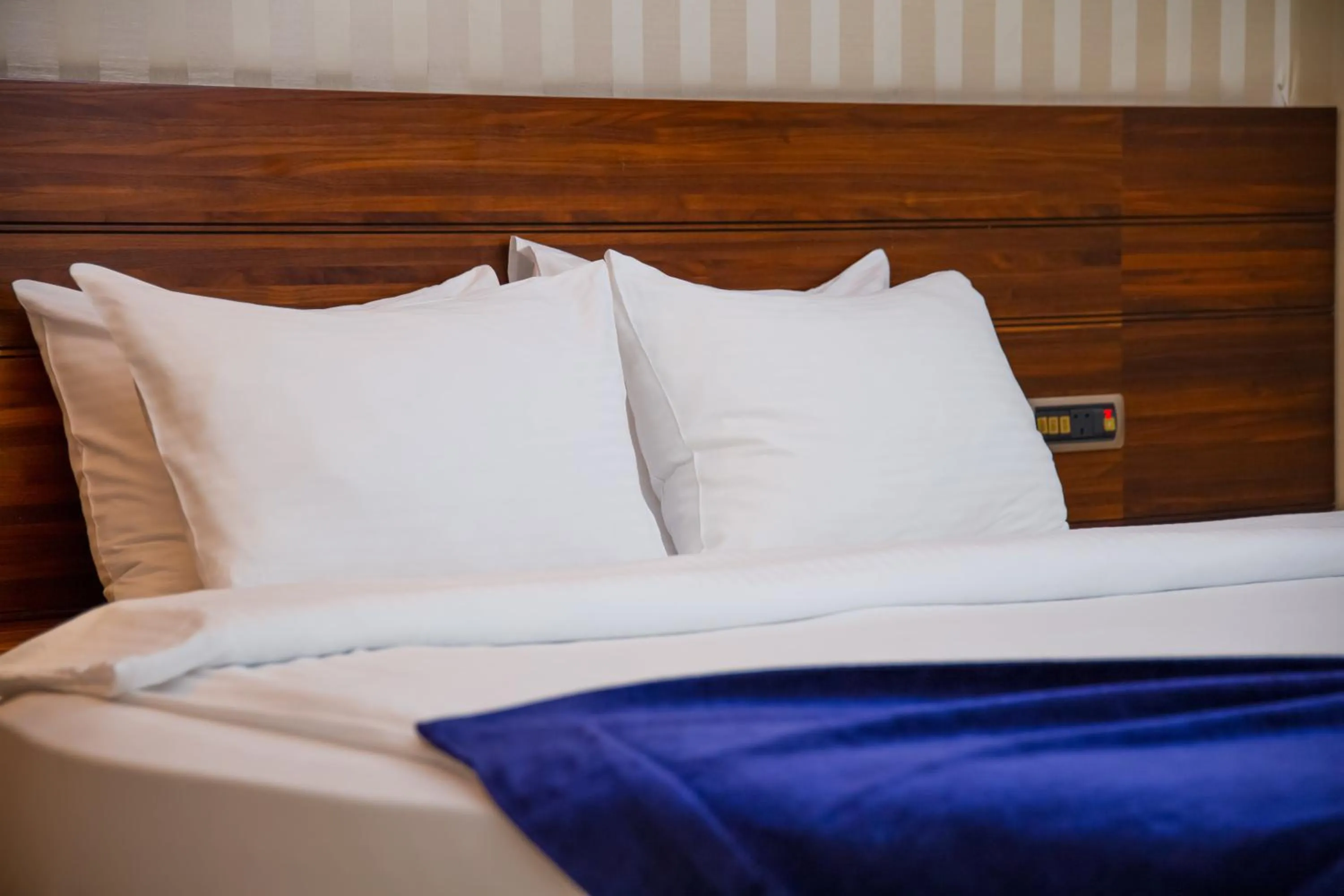 Bed in Gold Majesty Hotel