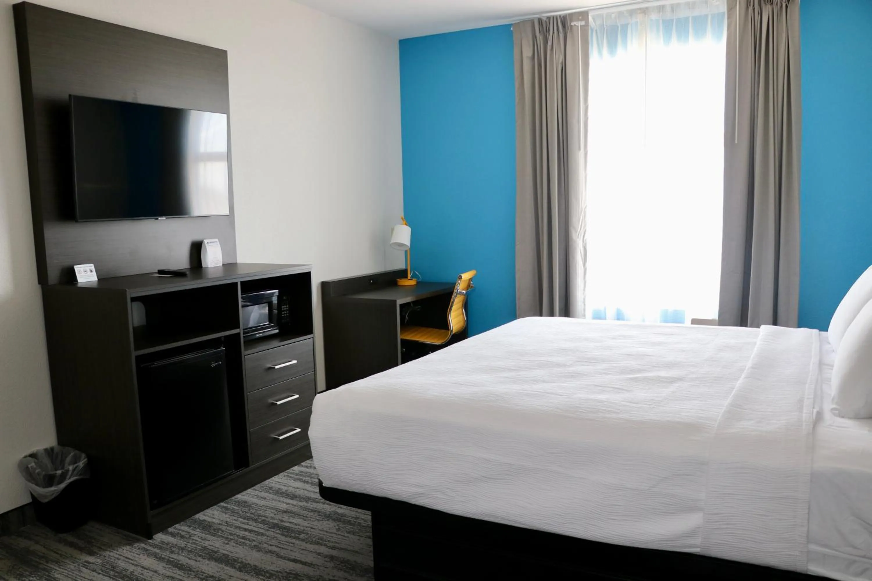 Bed in Quality Inn & Suites Buda