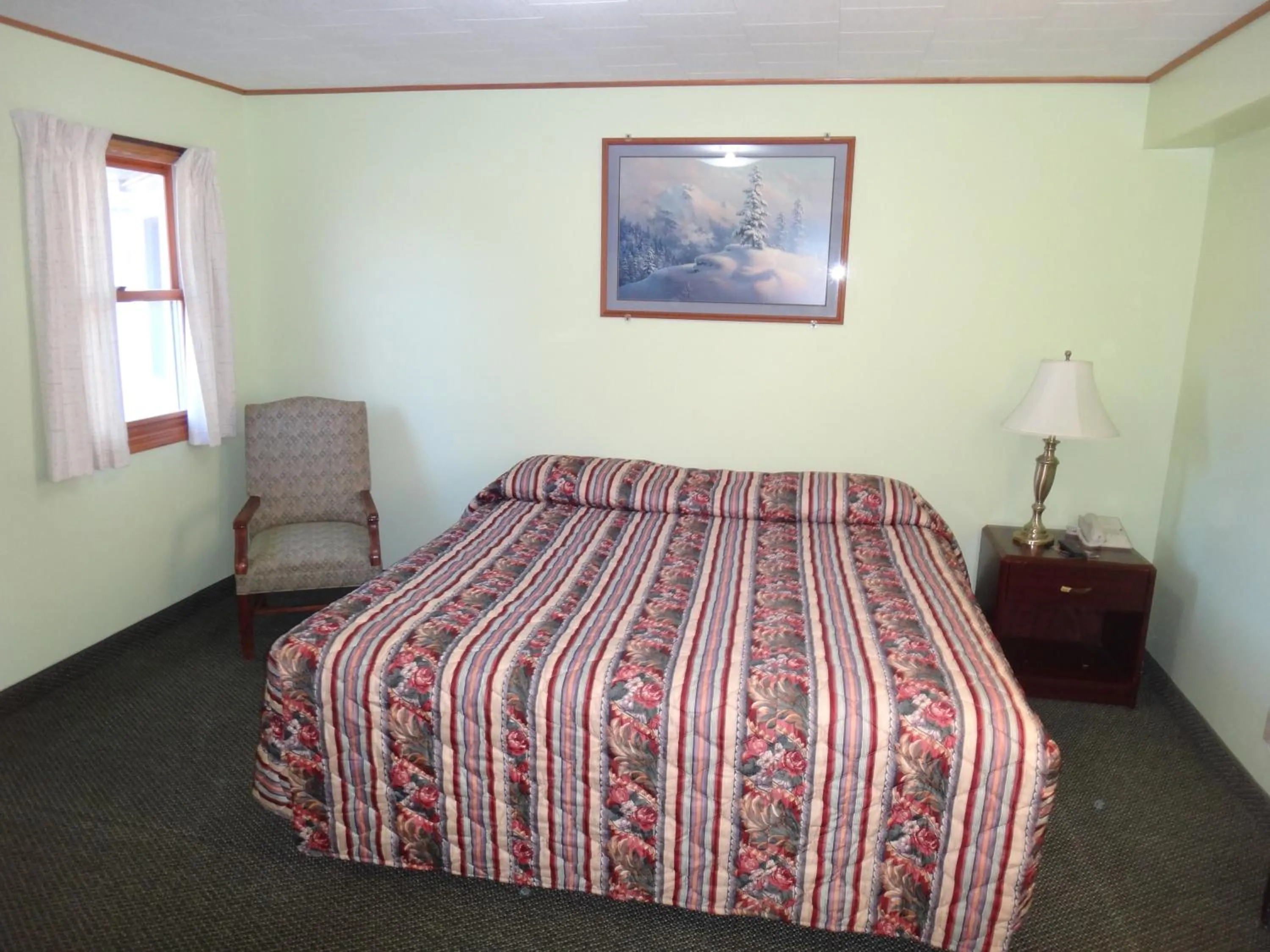 Bed in Pine Ridge Motel
